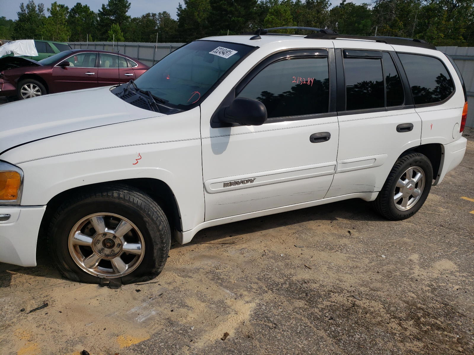 Photo 9 from auction – 2004 GMC ENVOY with VIN 1GKDT13SX42154063