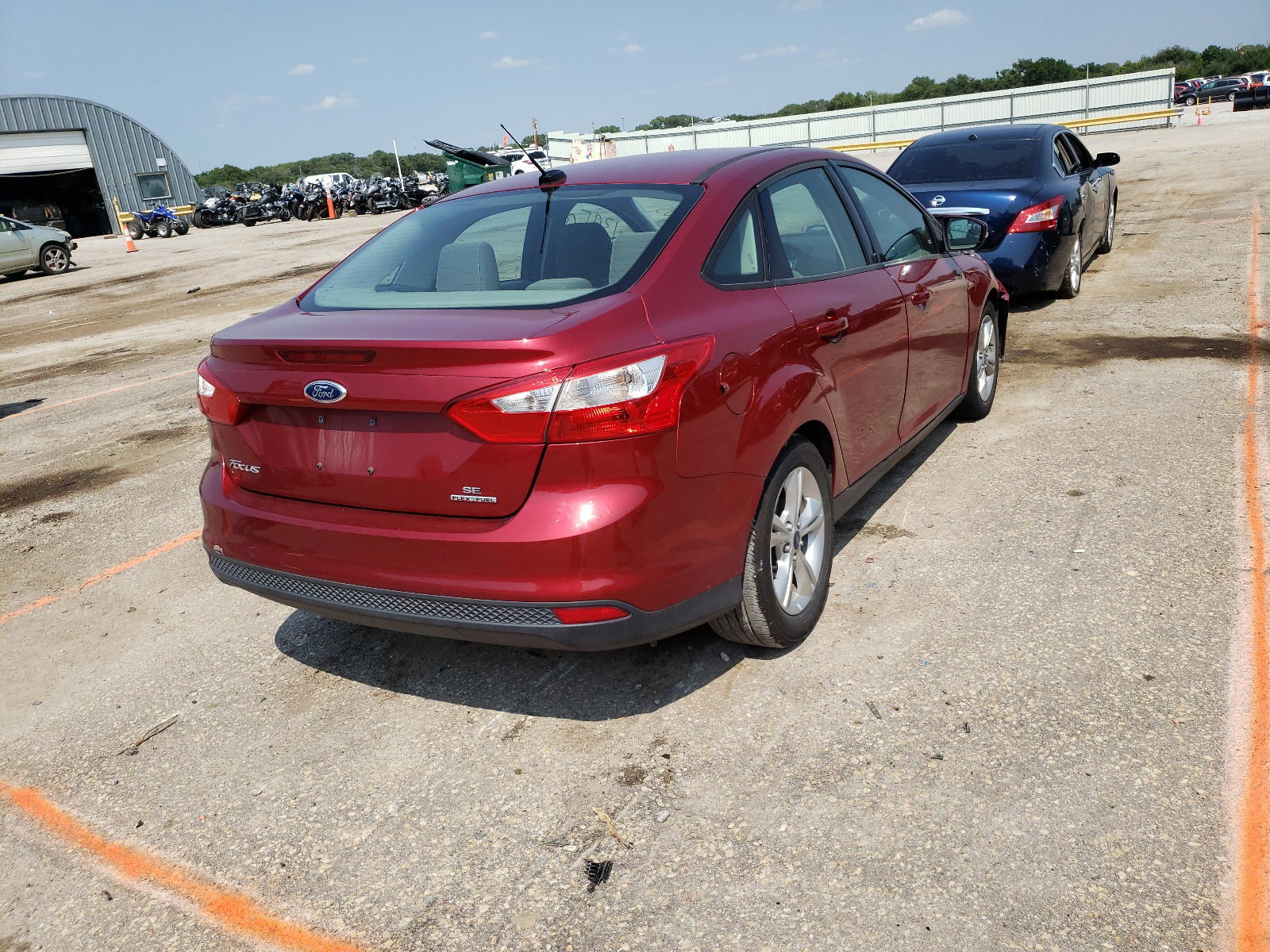 Photo 4 from auction – 2014 FORD FOCUS SE with VIN 1FADP3F24EL149434