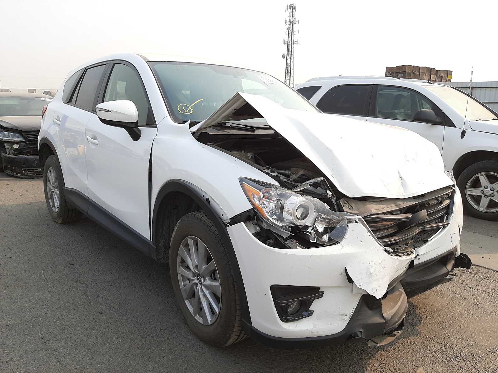 MAZDA CX-5 TOURI 2016 with VIN JM3KE4CY3G0910648 - Photo from auction