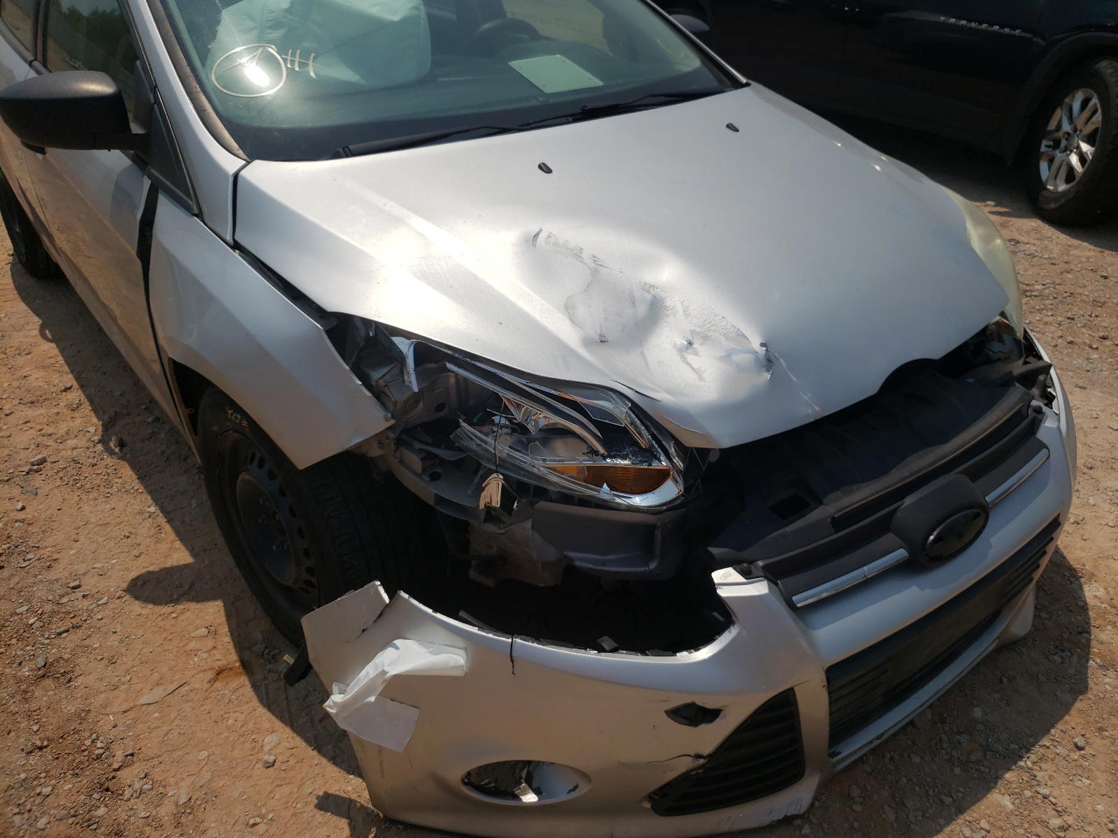 Photo 9 from auction – 2014 FORD FOCUS S with VIN 1FADP3E2XEL175411
