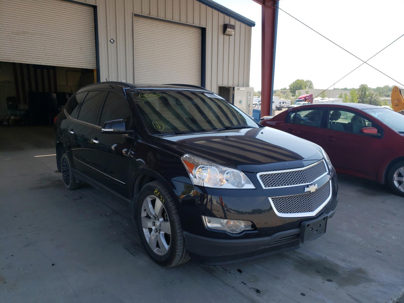 CHEVROLET TRAVERSE L 2012 with VIN 1GNKVLED9CJ219469 - Photo from auction