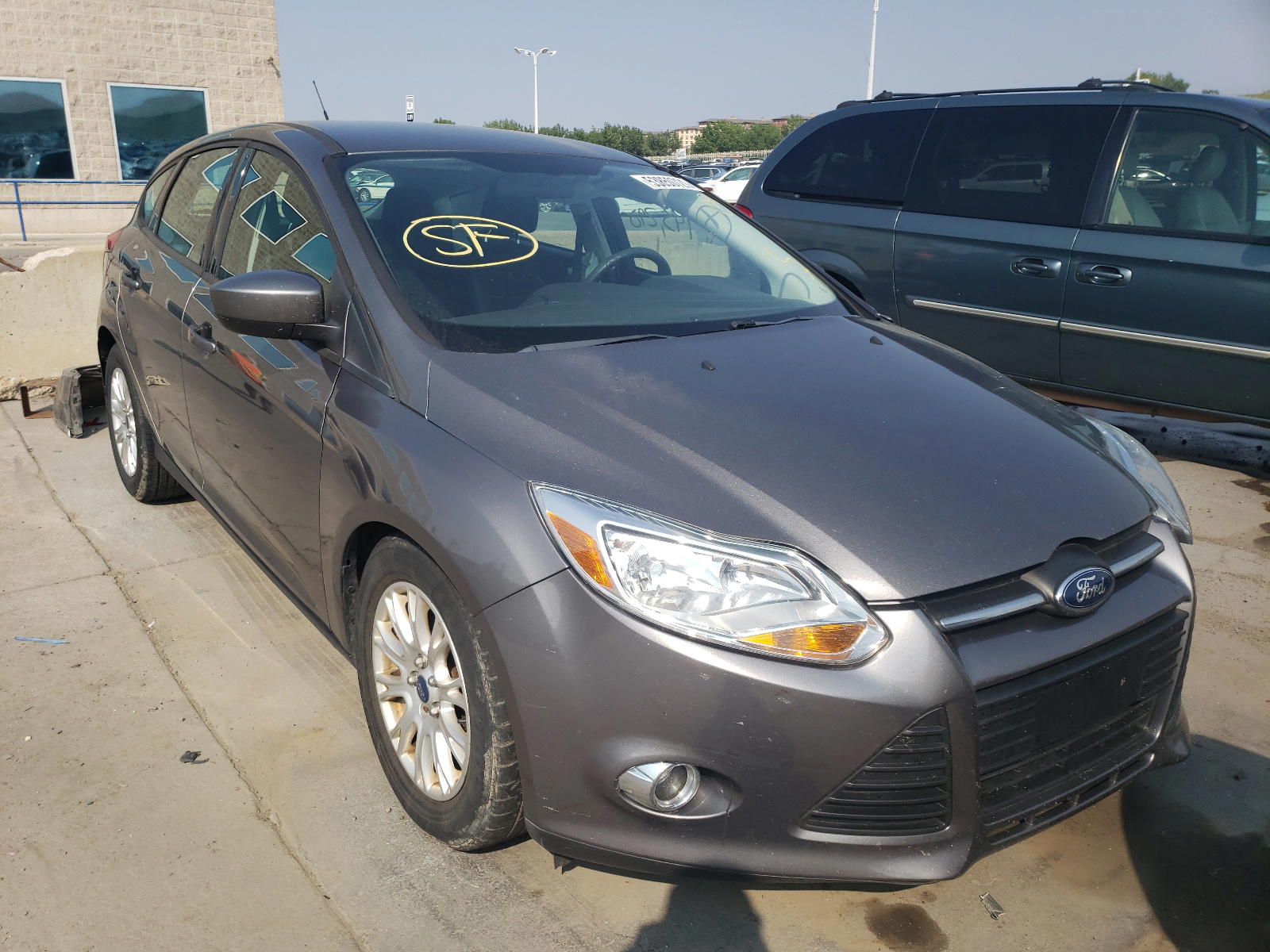 FORD FOCUS SE 2012 with VIN 1FAHP3K24CL373243 - Photo from auction