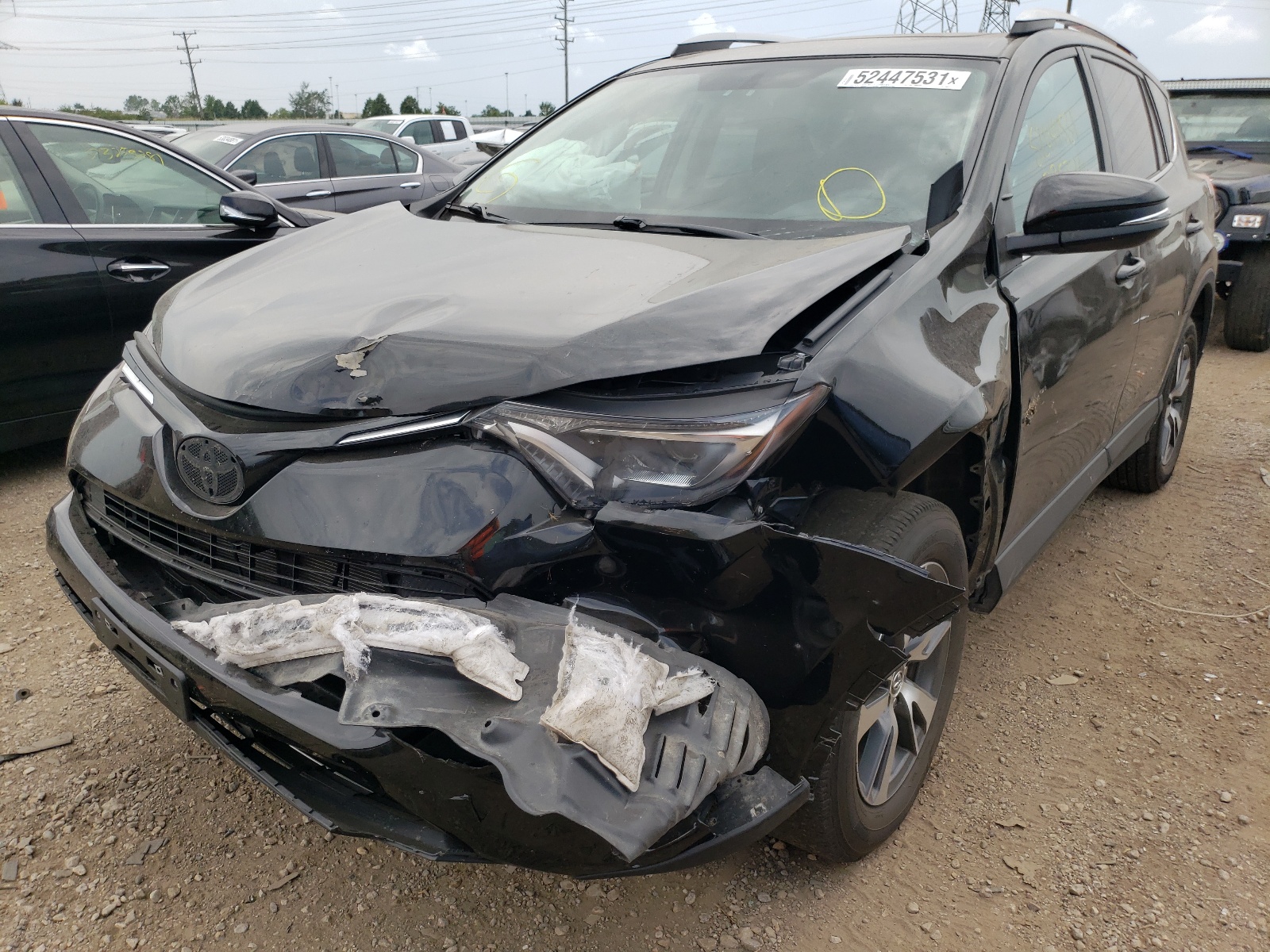 Photo 2 from auction – 2016 TOYOTA RAV4 XLE with VIN 2T3RFREV5GW443376