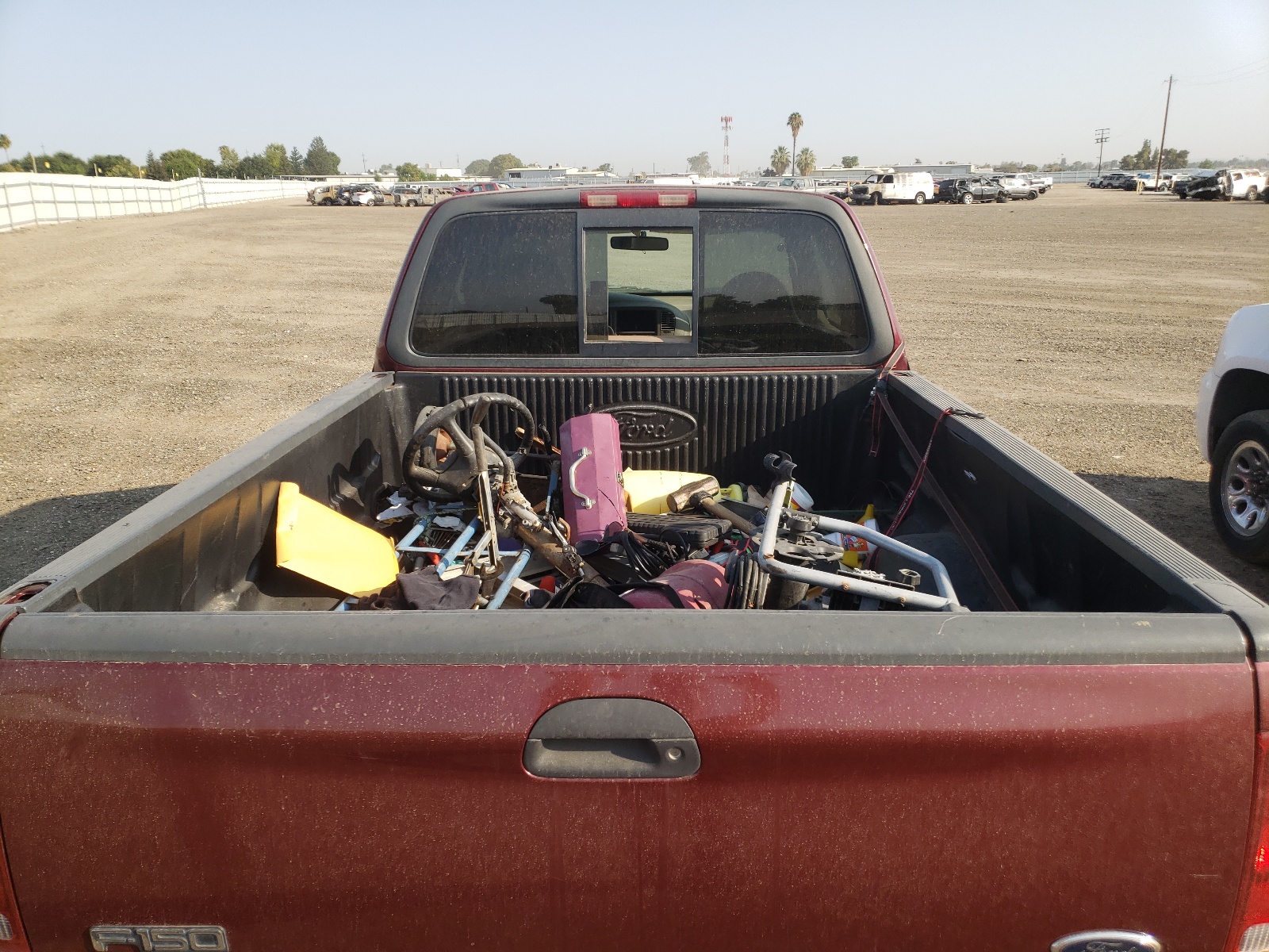 Photo 9 from auction – 1999 FORD F150 with VIN 1FTRX17L5XKB62729