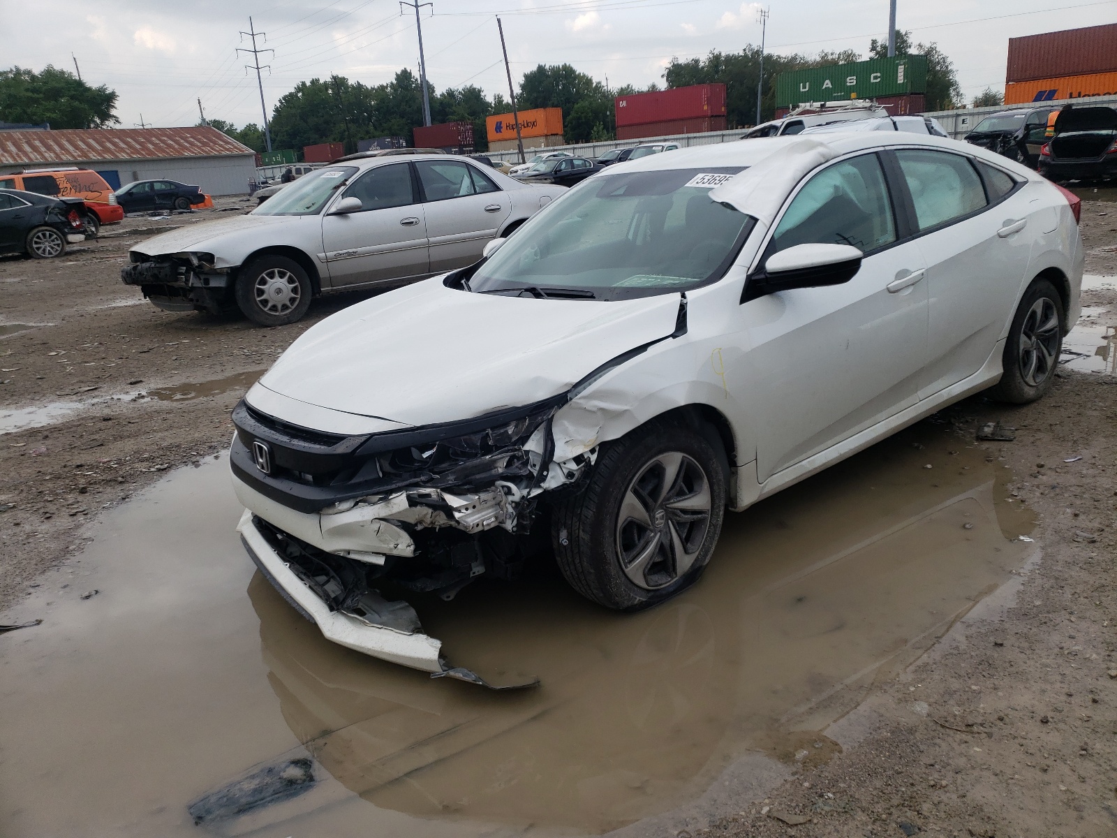 Photo 2 from auction – 2020 HONDA CIVIC LX with VIN 19XFC2F62LE030475