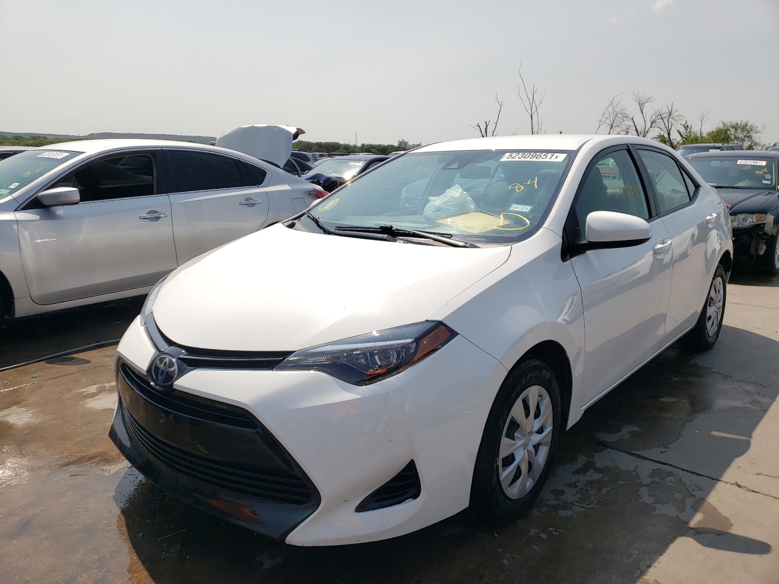 Photo 2 from auction – 2018 TOYOTA COROLLA L with VIN 5YFBURHE6JP780790