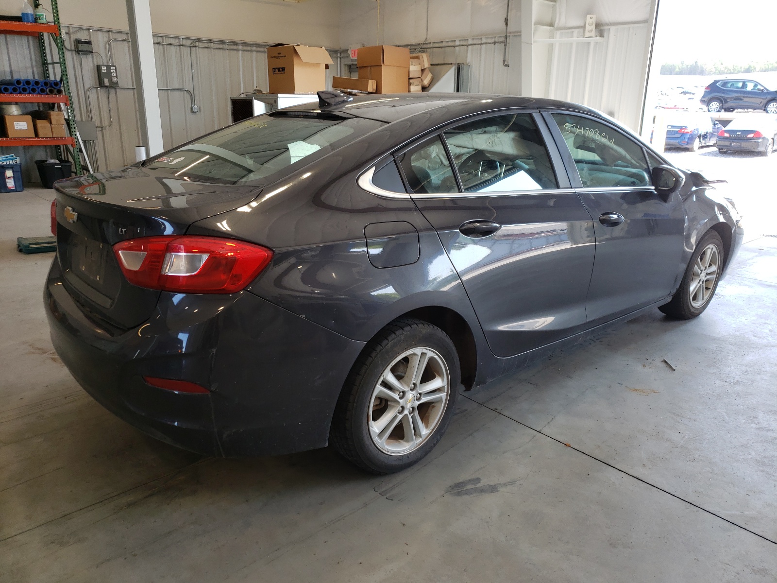 Photo 4 from auction – 2016 CHEVROLET CRUZE with VIN 1G1BE5SM0G7283260