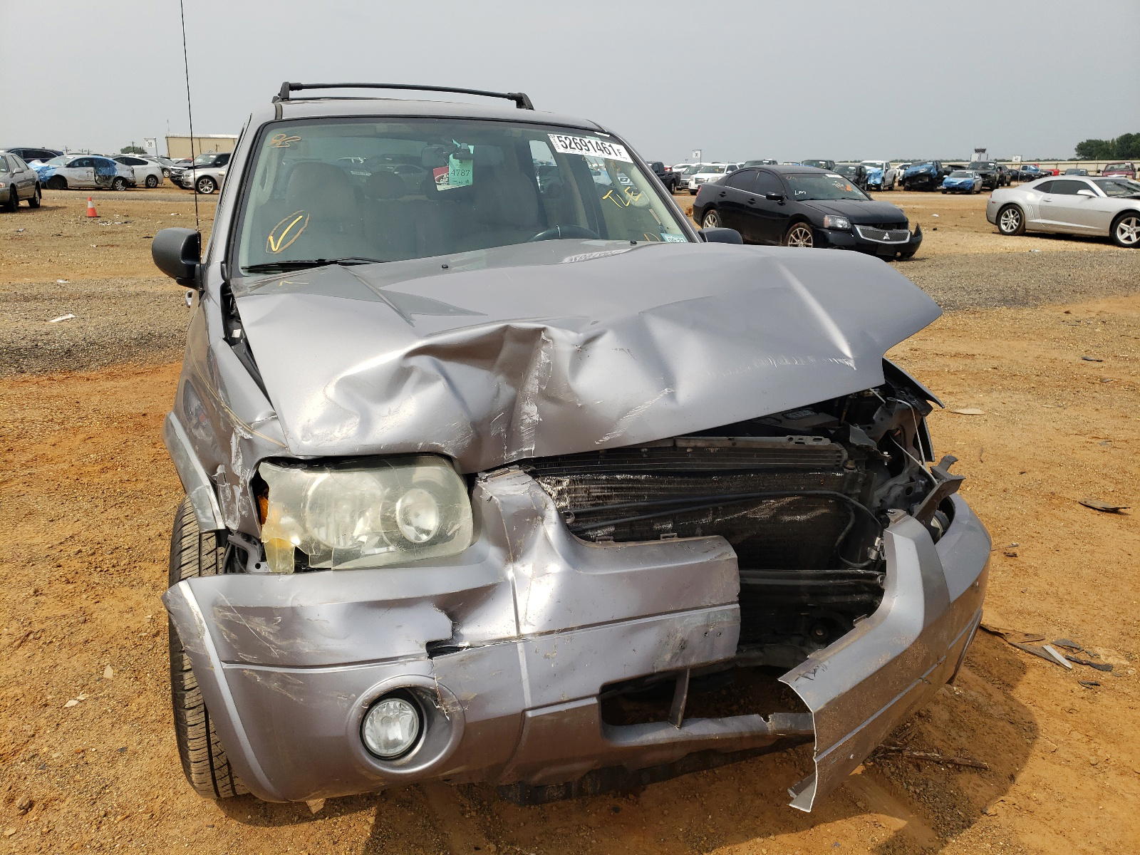 Photo 9 from auction – 2007 FORD ESCAPE LIM with VIN 1FMCU04157KB08113
