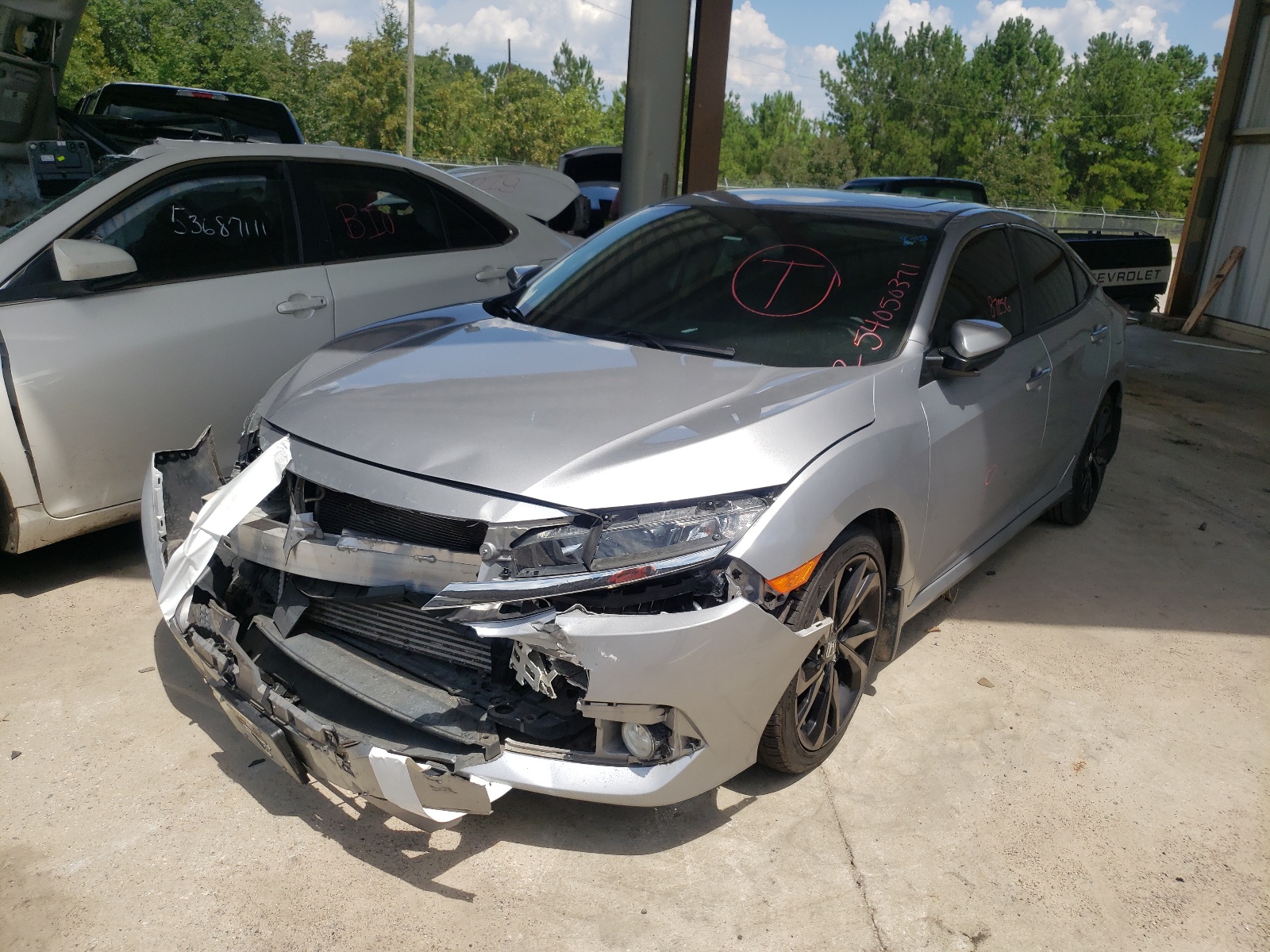 Photo 2 from auction – 2017 HONDA CIVIC EXL with VIN 2HGFC1F75HH658773