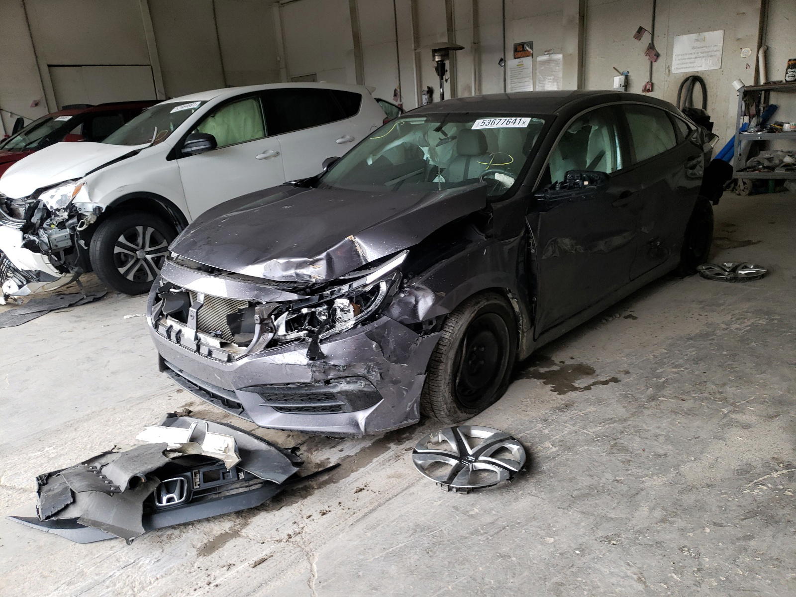 Photo 2 from auction – 2017 HONDA CIVIC LX with VIN 19XFC2F53HE021198