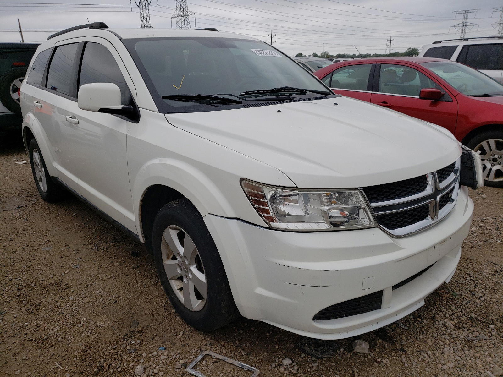 DODGE JOURNEY MA 2011 with VIN 3D4PG1FG0BT524360 - Photo from auction