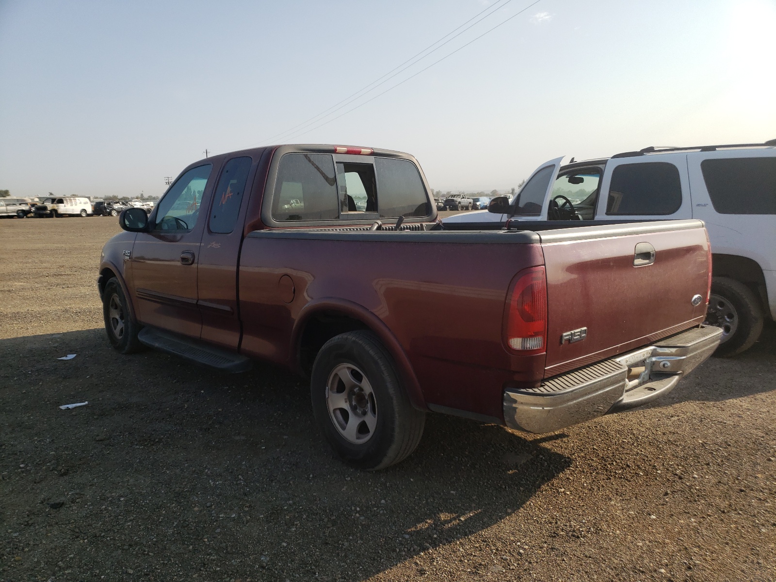Photo 3 from auction – 1999 FORD F150 with VIN 1FTRX17L5XKB62729