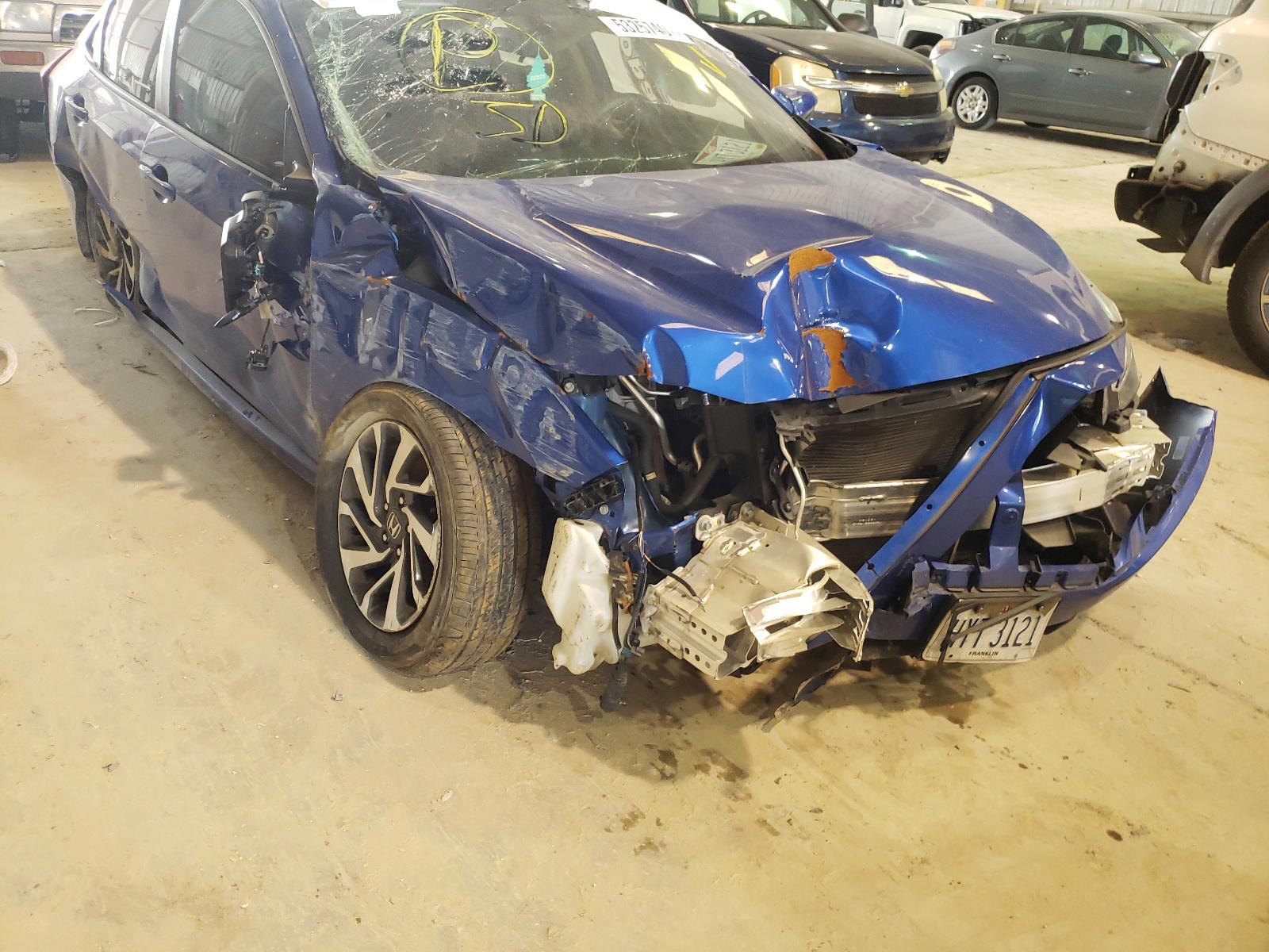 HONDA CIVIC EX 2017 with VIN 19XFC2F72HE009156 - Photo from auction