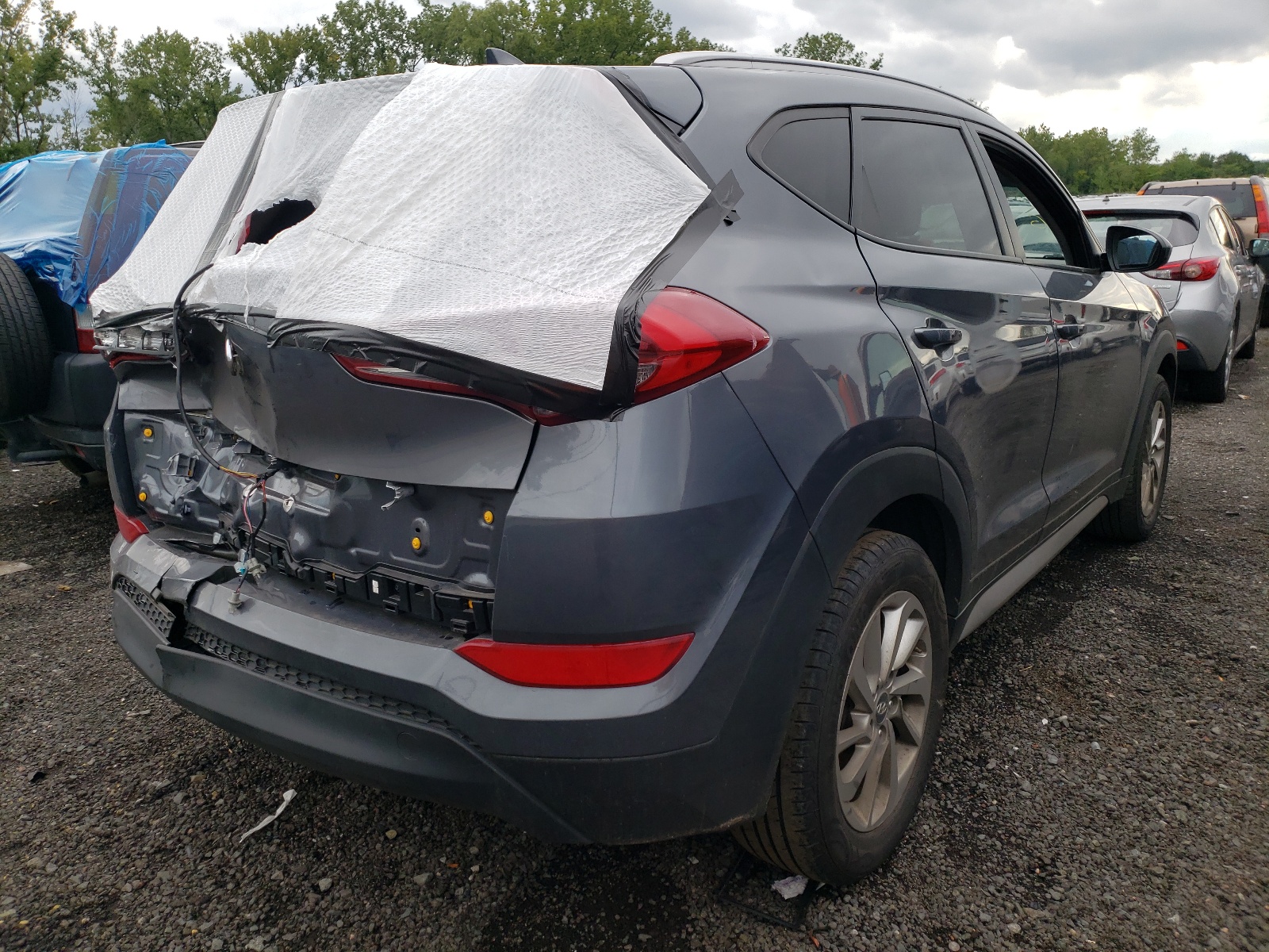 Photo 4 from auction – 2018 HYUNDAI TUCSON SEL with VIN KM8J3CA44JU718820