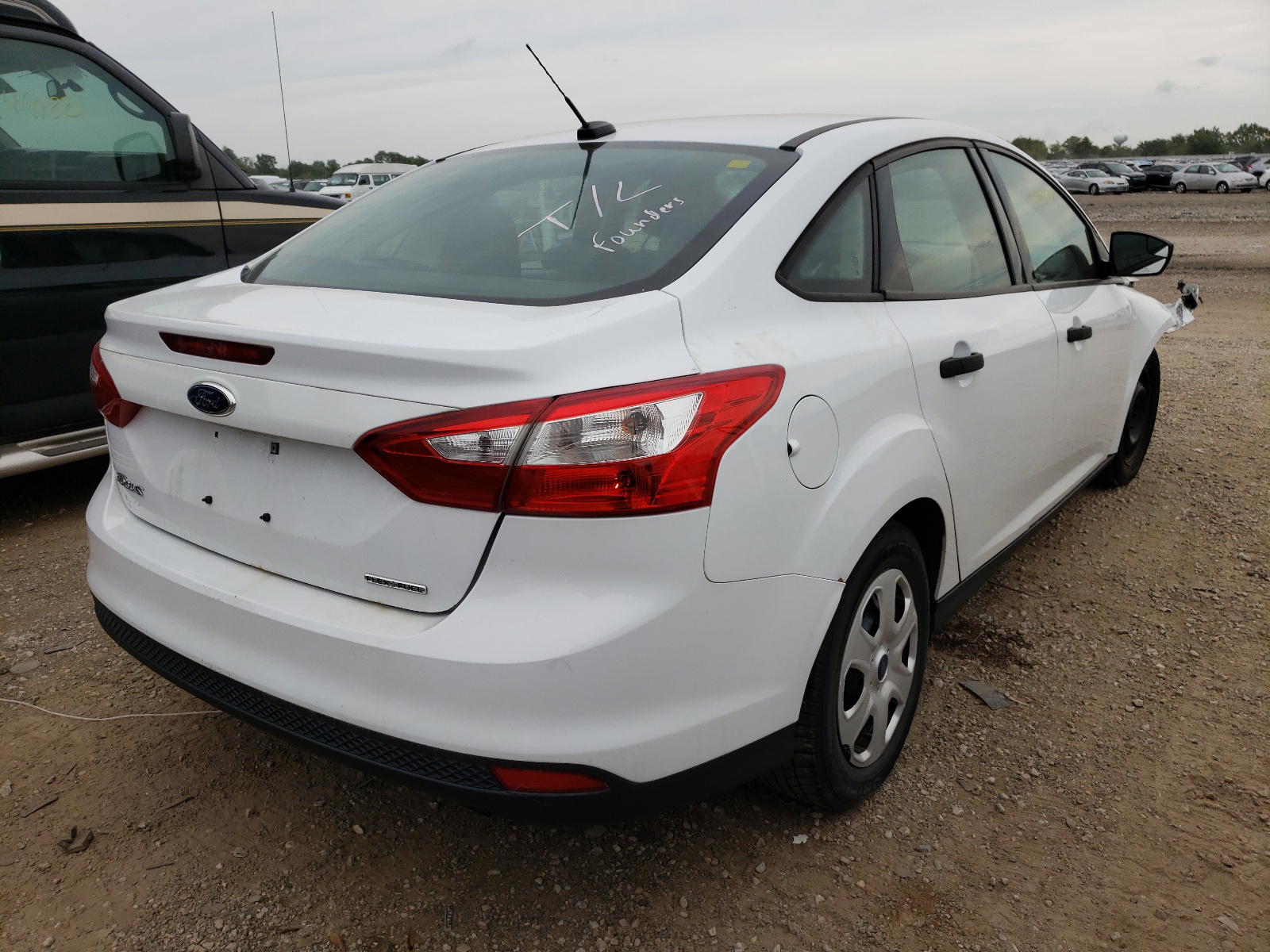 Photo 4 from auction – 2013 FORD FOCUS S with VIN 1FADP3E2XDL156341