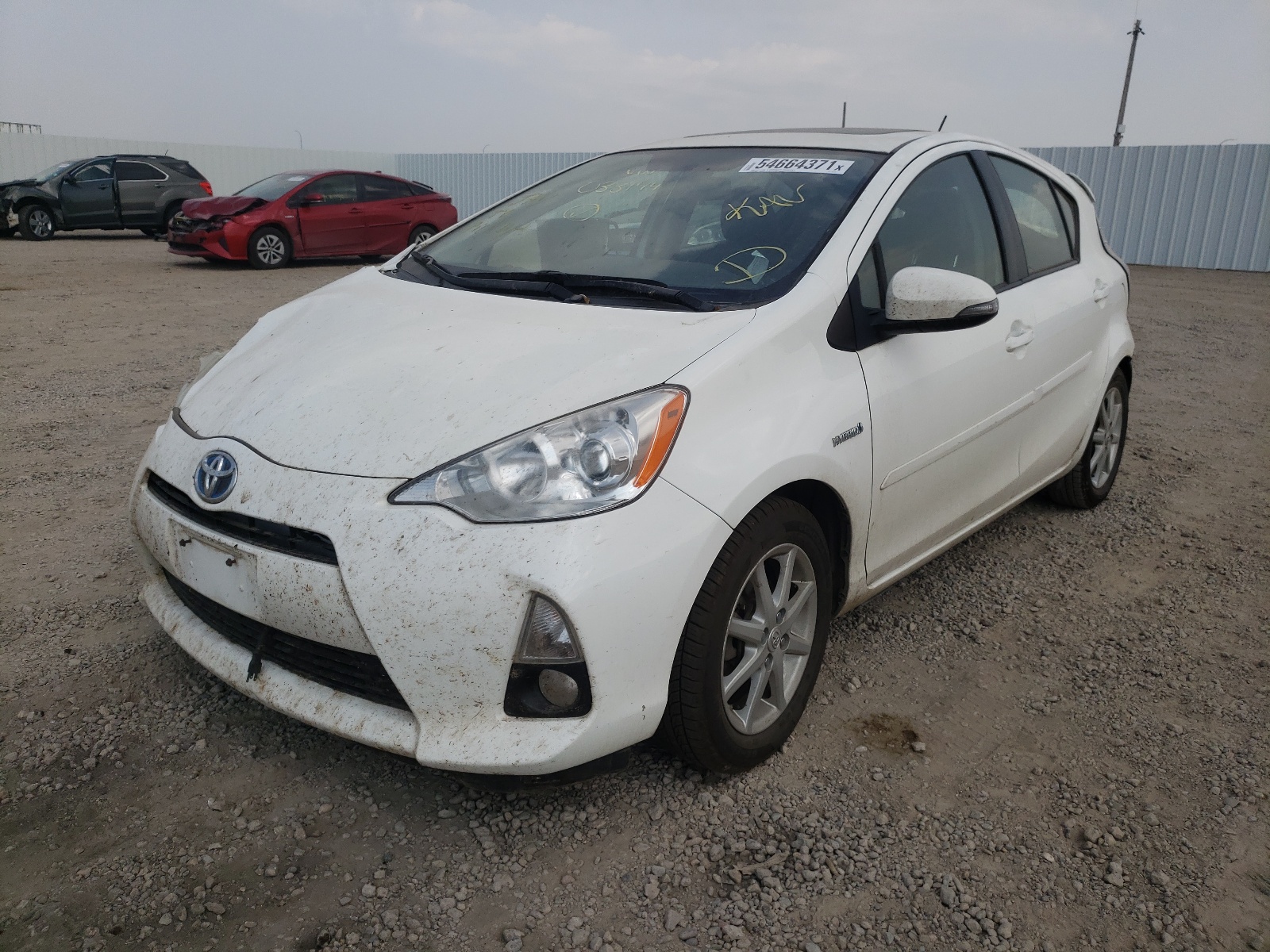 Photo 2 from auction – 2013 TOYOTA PRIUS C with VIN JTDKDTB33D1033144
