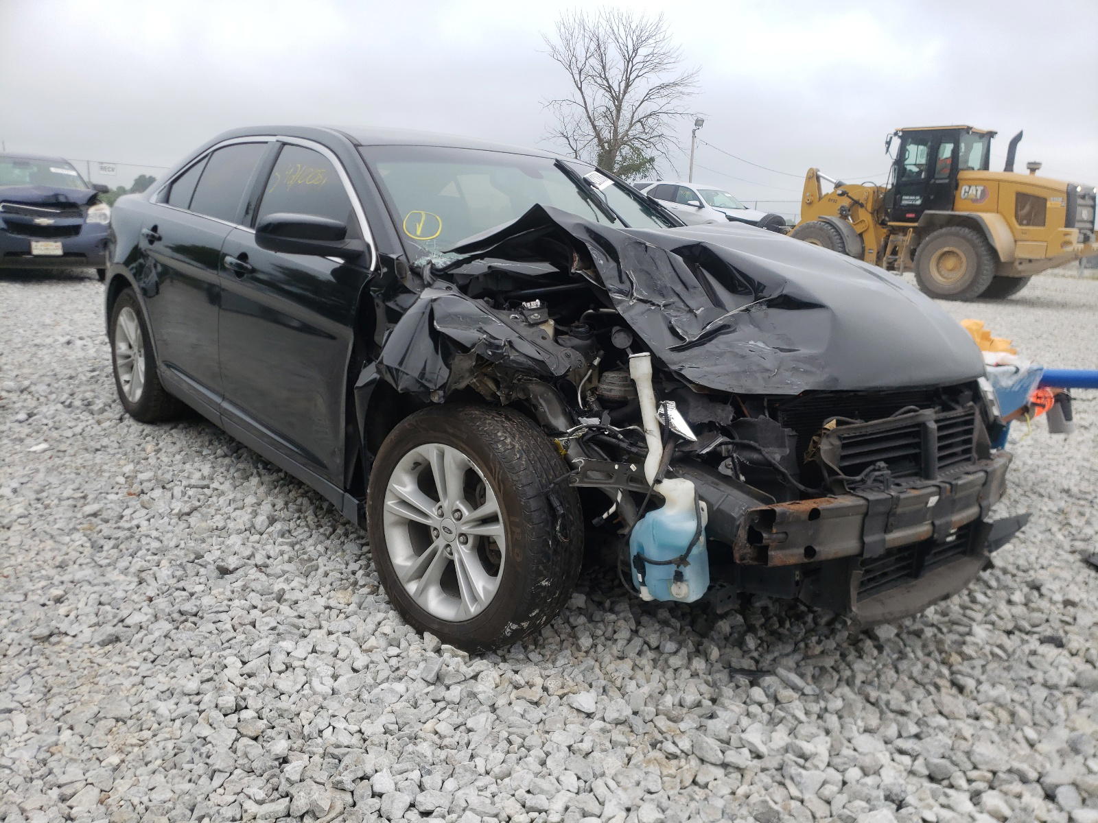 FORD TAURUS SEL 2013 with VIN 1FAHP2E8XDG130122 - Photo from auction