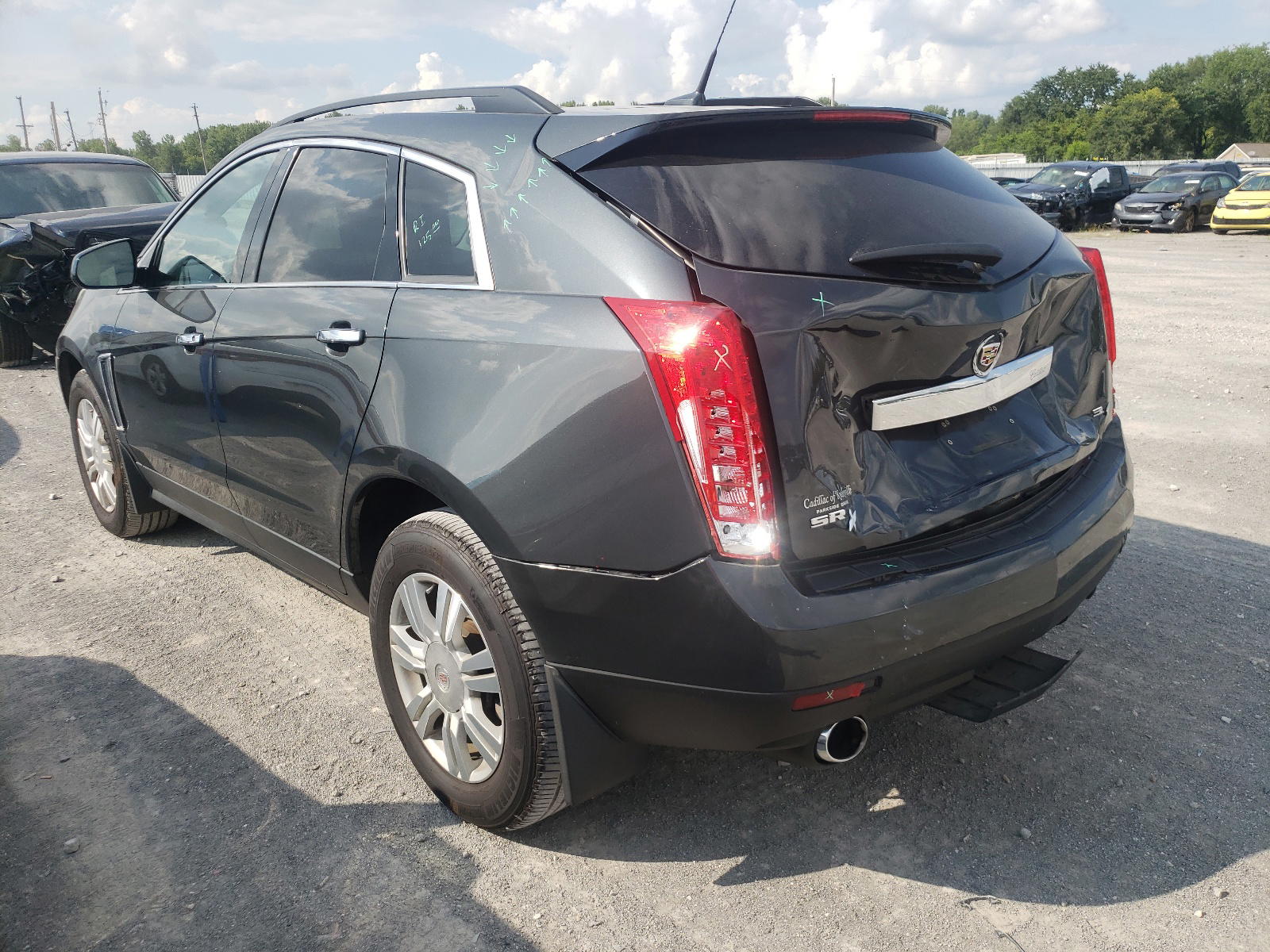 Photo 3 from auction – 2014 CADILLAC SRX with VIN 3GYFNAE33ES546614