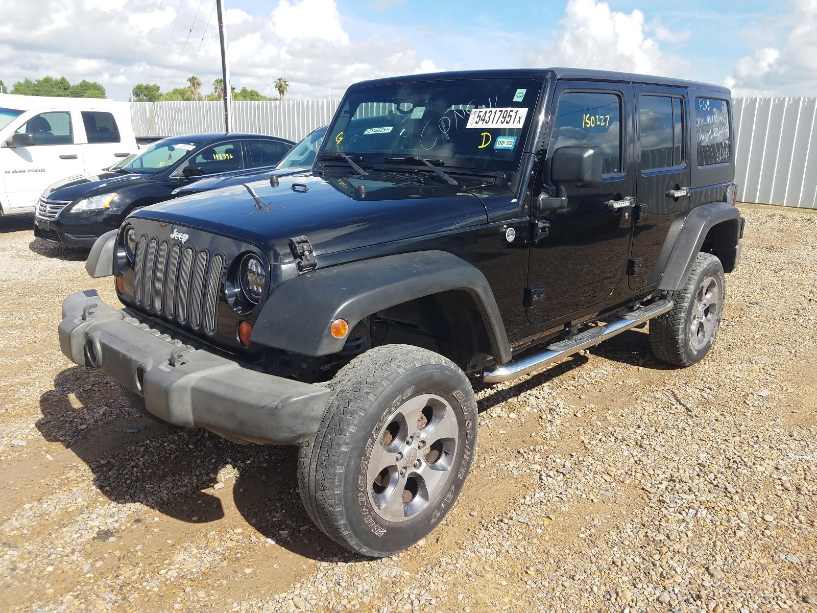 Photo 2 from auction – 2012 JEEP WRANGLER U with VIN 1C4BJWDG9CL113285