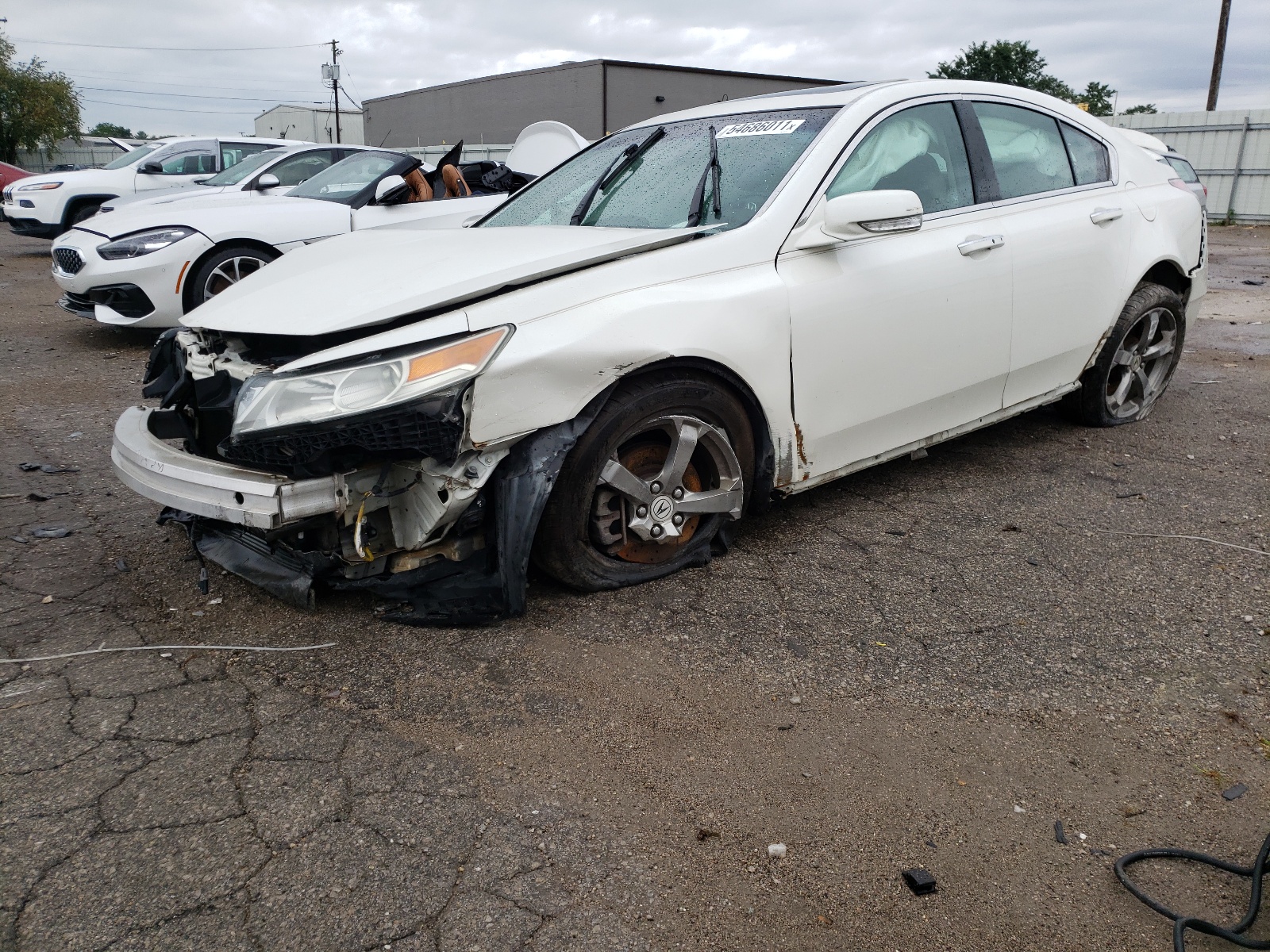 Photo 2 from auction – 2010 ACURA TL with VIN 19UUA9F51AA001743