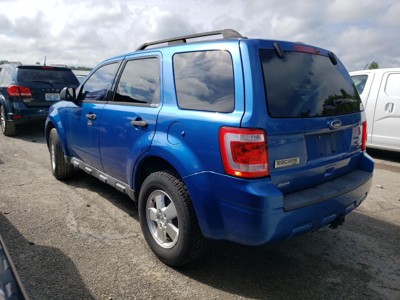Photo 3 from auction – 2011 FORD ESCAPE XLT with VIN 1FMCU0DG9BKC70856