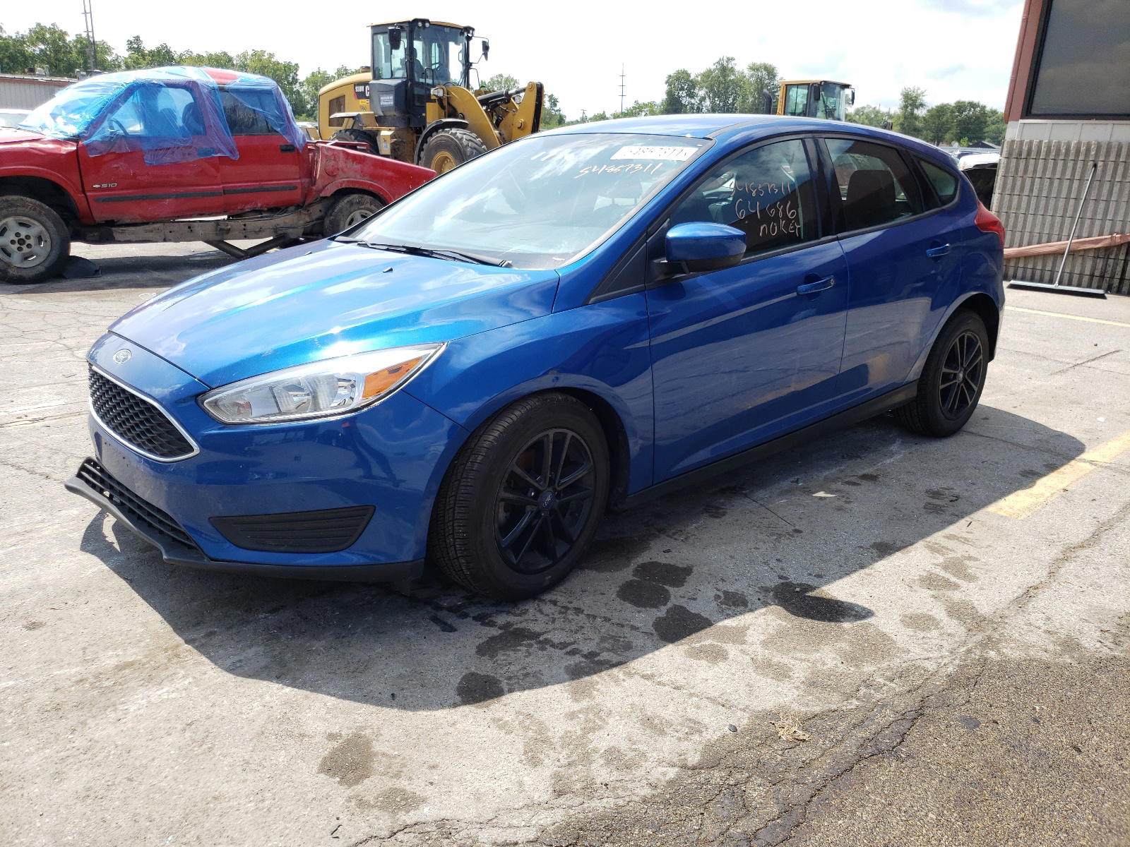 Photo 2 from auction – 2018 FORD FOCUS SE with VIN 1FADP3K29JL206047