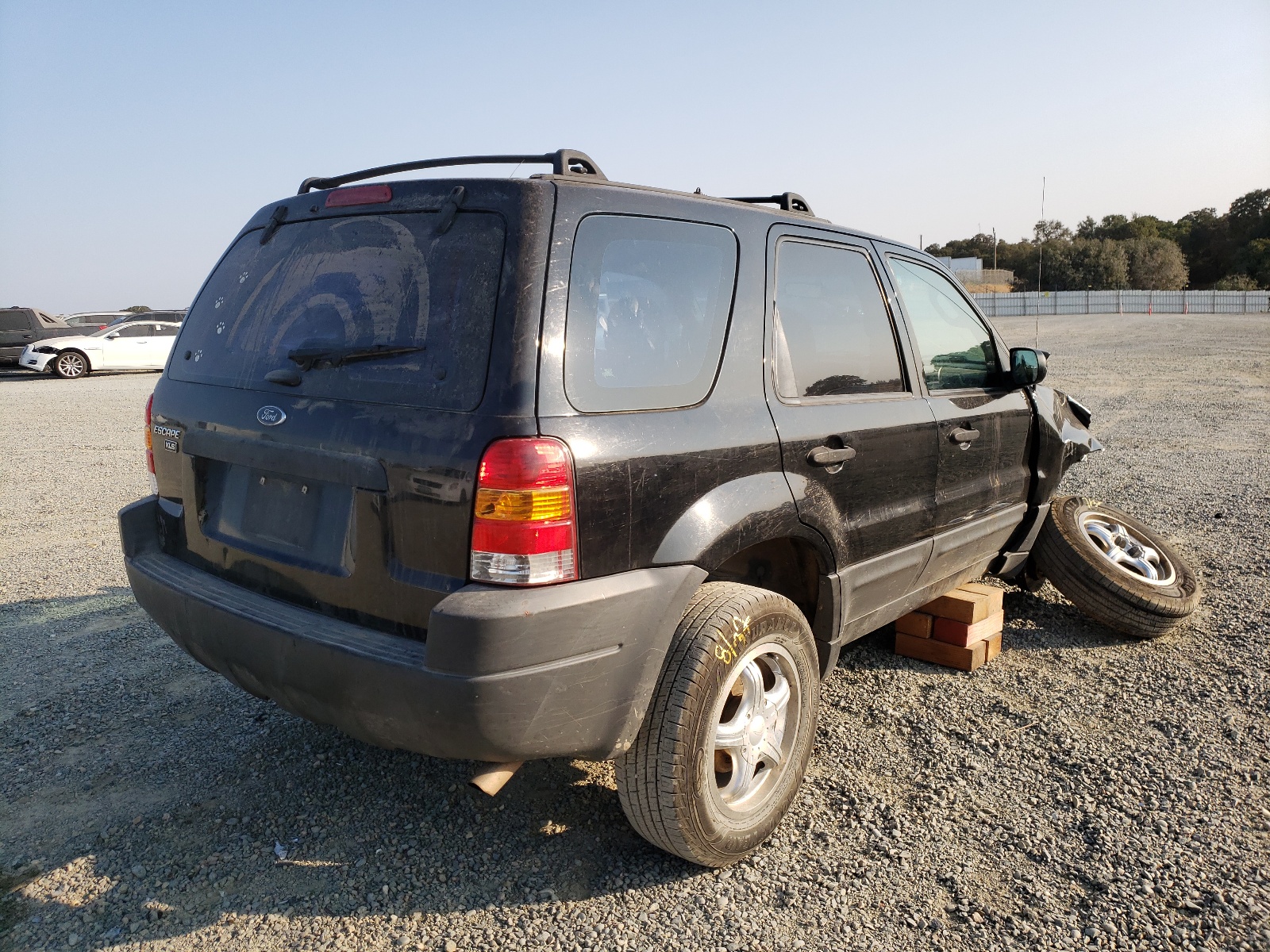 Photo 4 from auction – 2003 FORD ESCAPE XLS with VIN 1FMYU92193KA39160