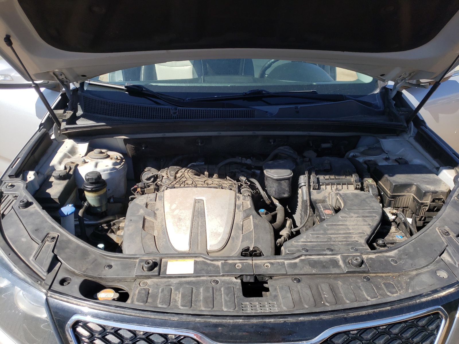 Photo 7 from auction – 2013 KIA SORENTO SX with VIN 5XYKWDA29DG313076