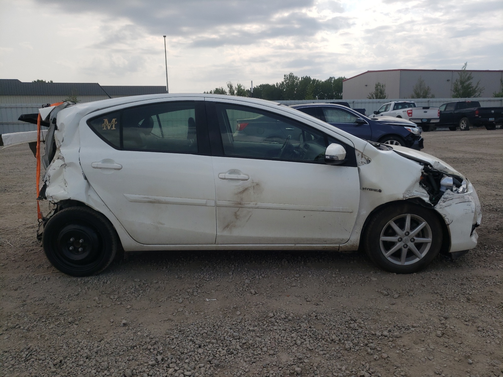 Photo 9 from auction – 2013 TOYOTA PRIUS C with VIN JTDKDTB33D1033144