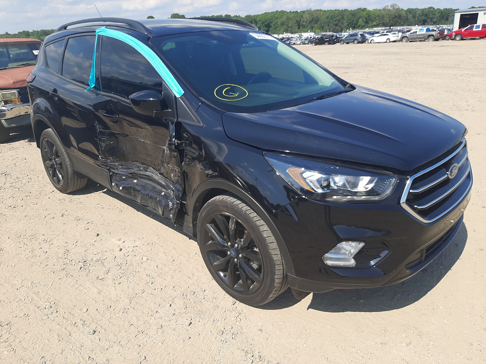 FORD ESCAPE SE 2019 with VIN 1FMCU0GD7KUB29466 - Photo from auction