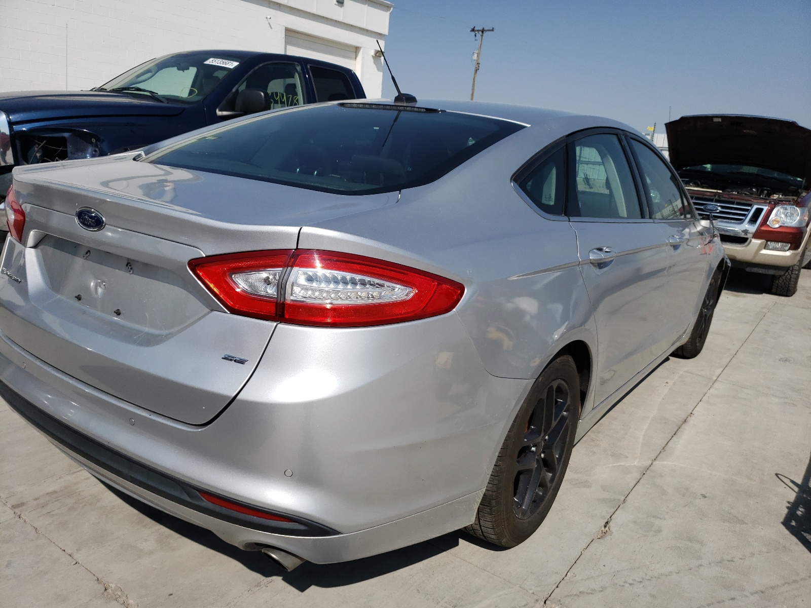 Photo 4 from auction – 2014 FORD FUSION SE with VIN 3FA6P0H75ER143692