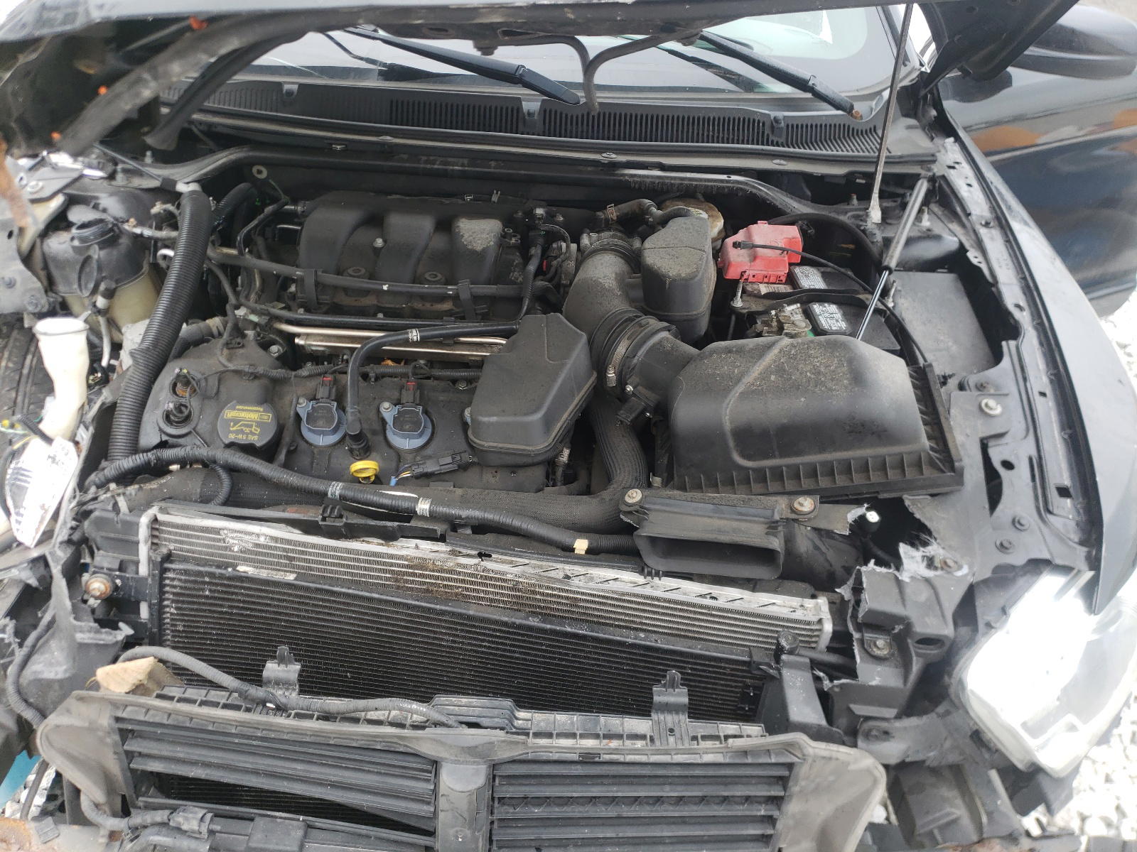 Photo 7 from auction – 2013 FORD TAURUS SEL with VIN 1FAHP2E8XDG130122