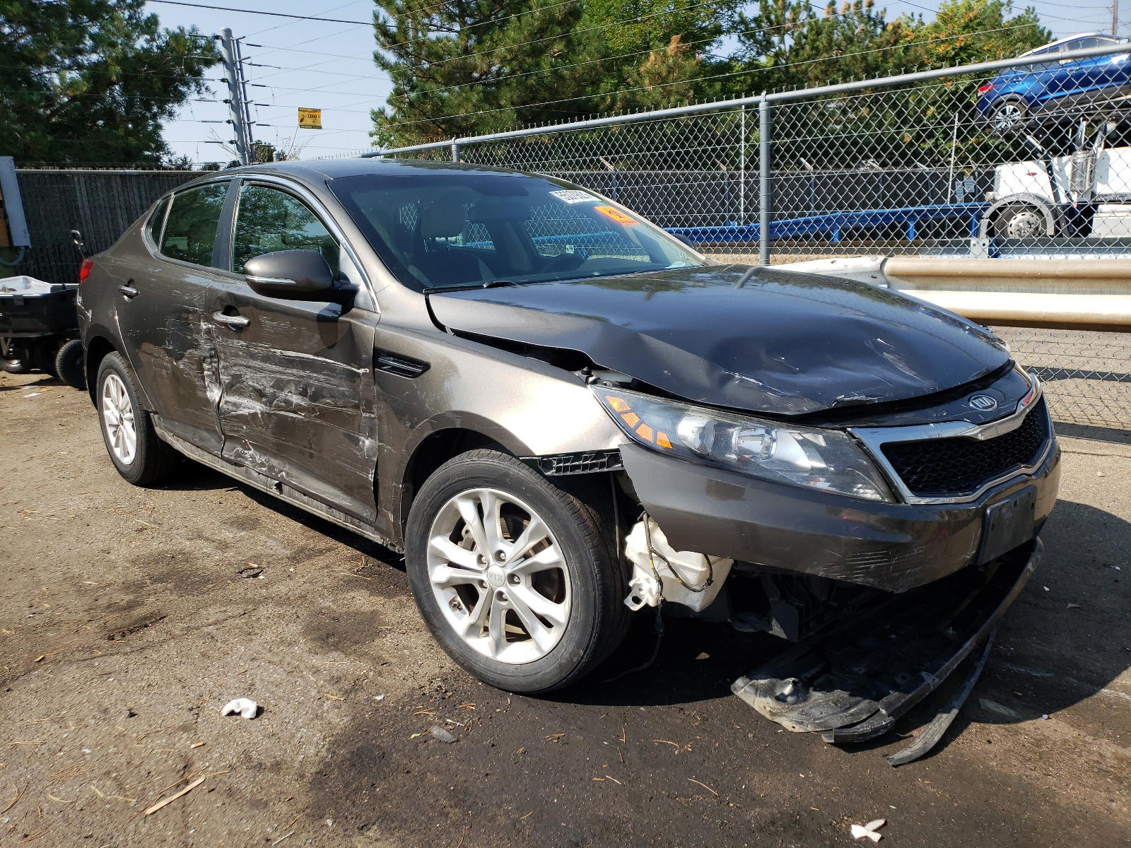 KIA OPTIMA LX 2012 with VIN 5XXGM4A77CG063394 - Photo from auction