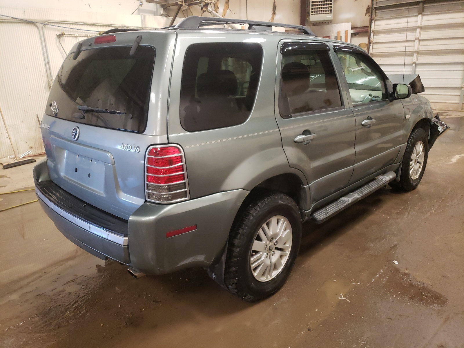 Photo 4 from auction – 2006 MERCURY MARINER with VIN 4M2YU57136DJ01564