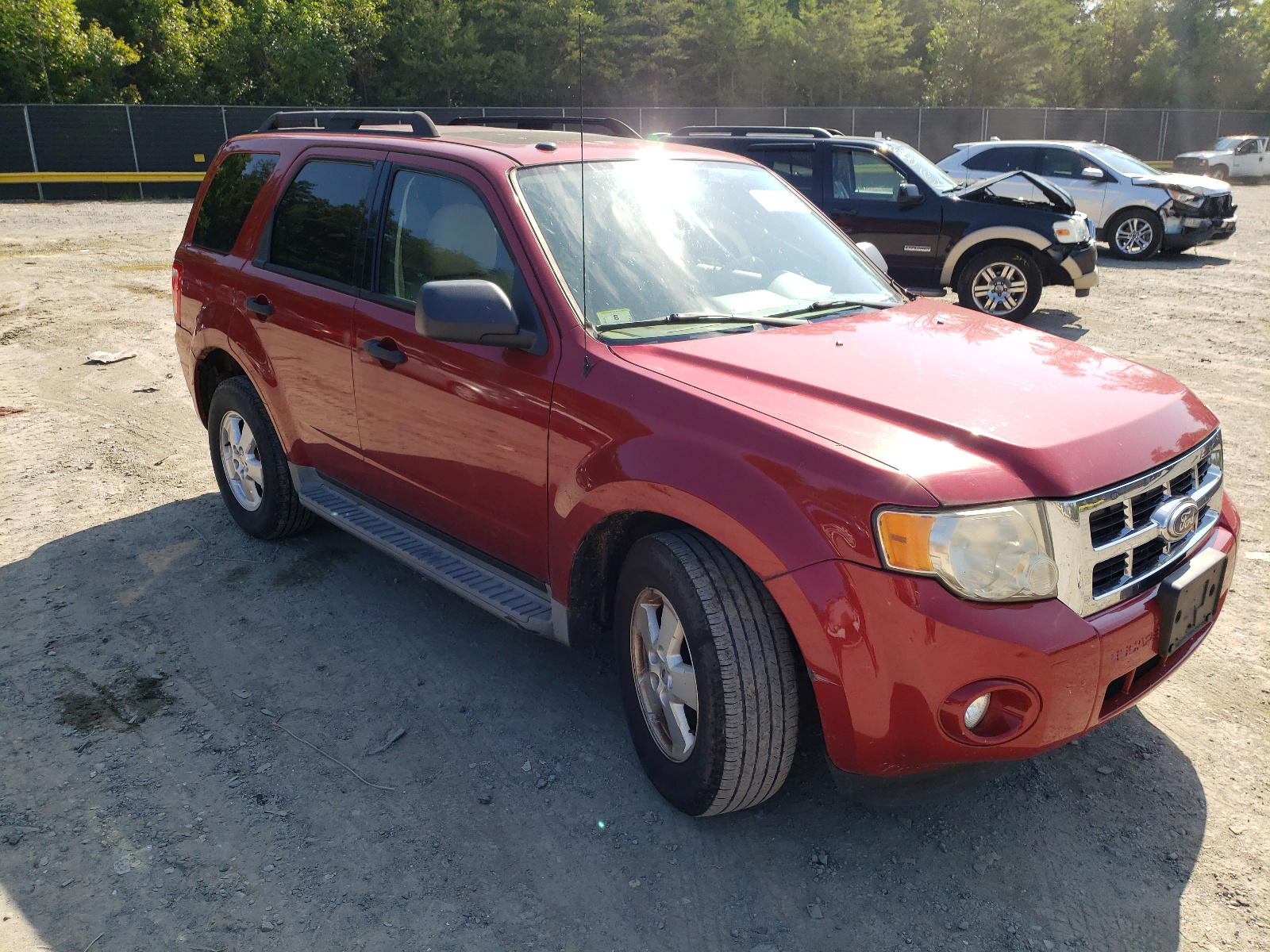 FORD ESCAPE 2010 with VIN 1FMCU9D71AKD16215 - Photo from auction