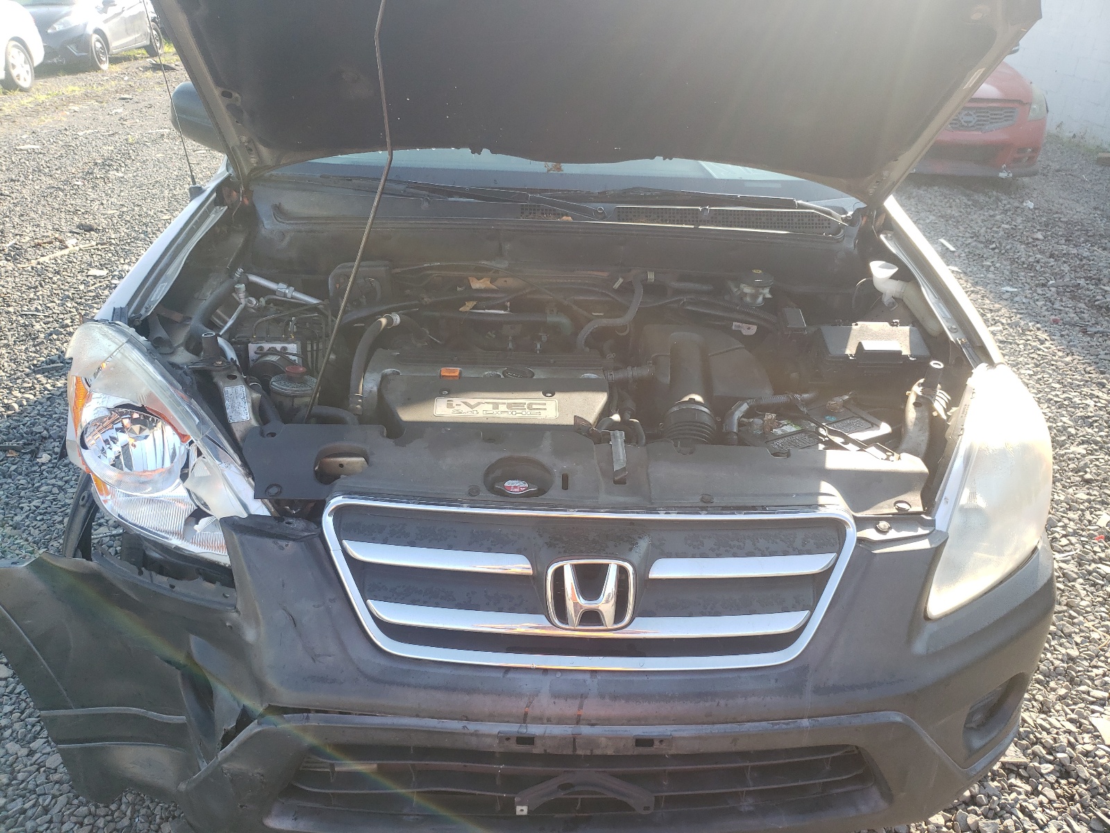 Photo 7 from auction – 2006 HONDA CR-V LX with VIN JHLRD78556C047197