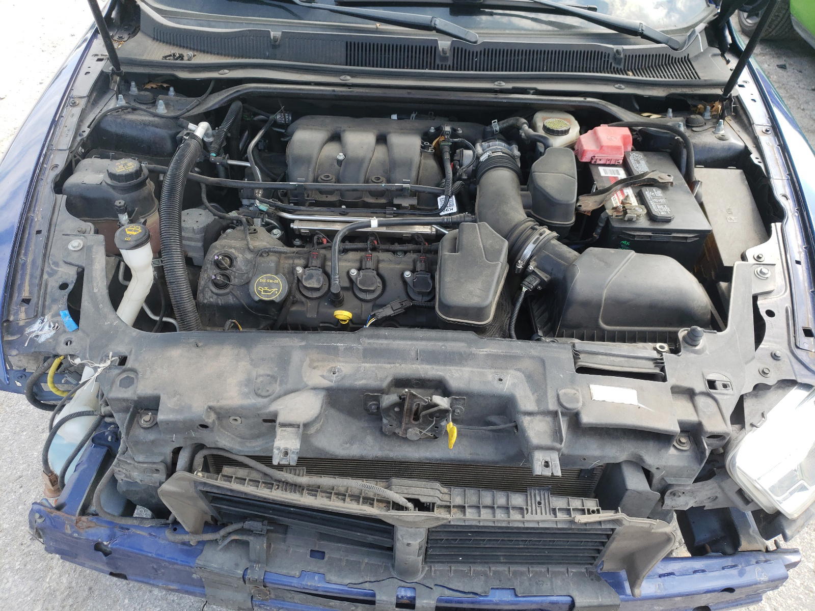 Photo 7 from auction – 2014 FORD TAURUS SEL with VIN 1FAHP2H82EG160034
