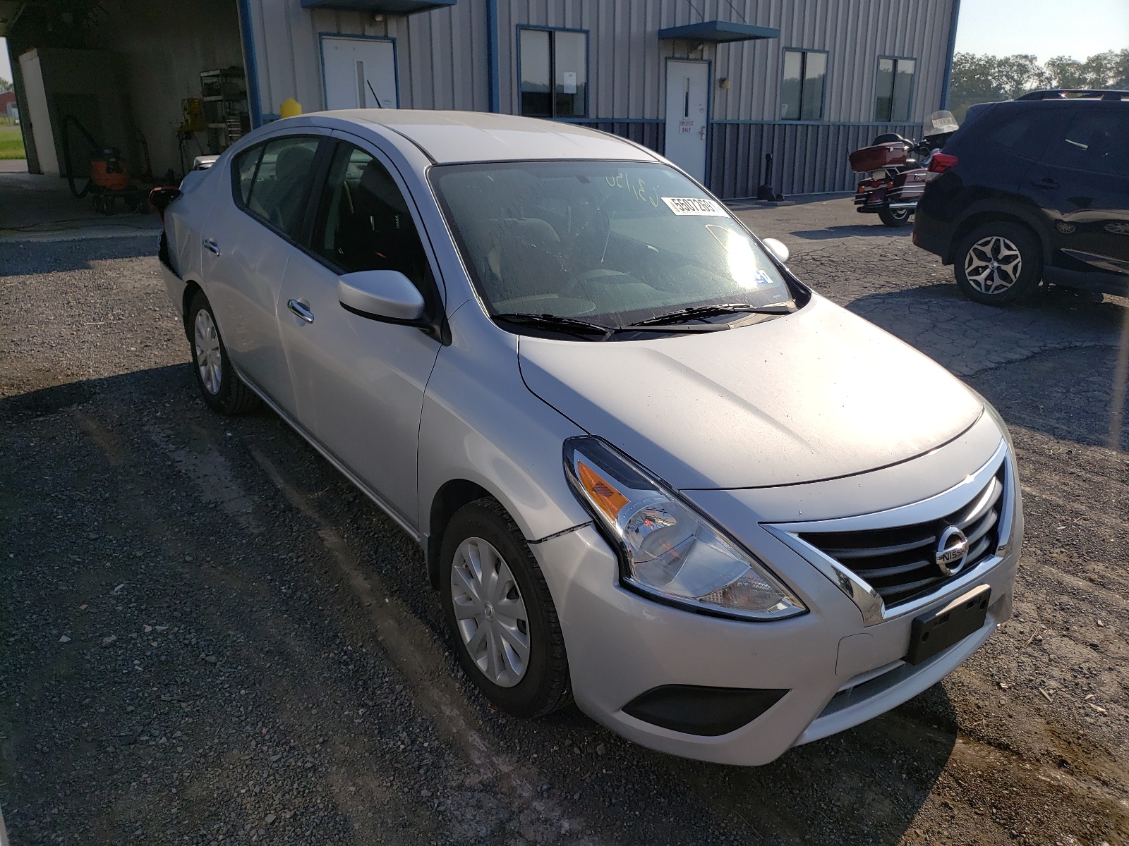 NISSAN VERSA S 2017 with VIN 3N1CN7AP0HL810586 - Photo from auction