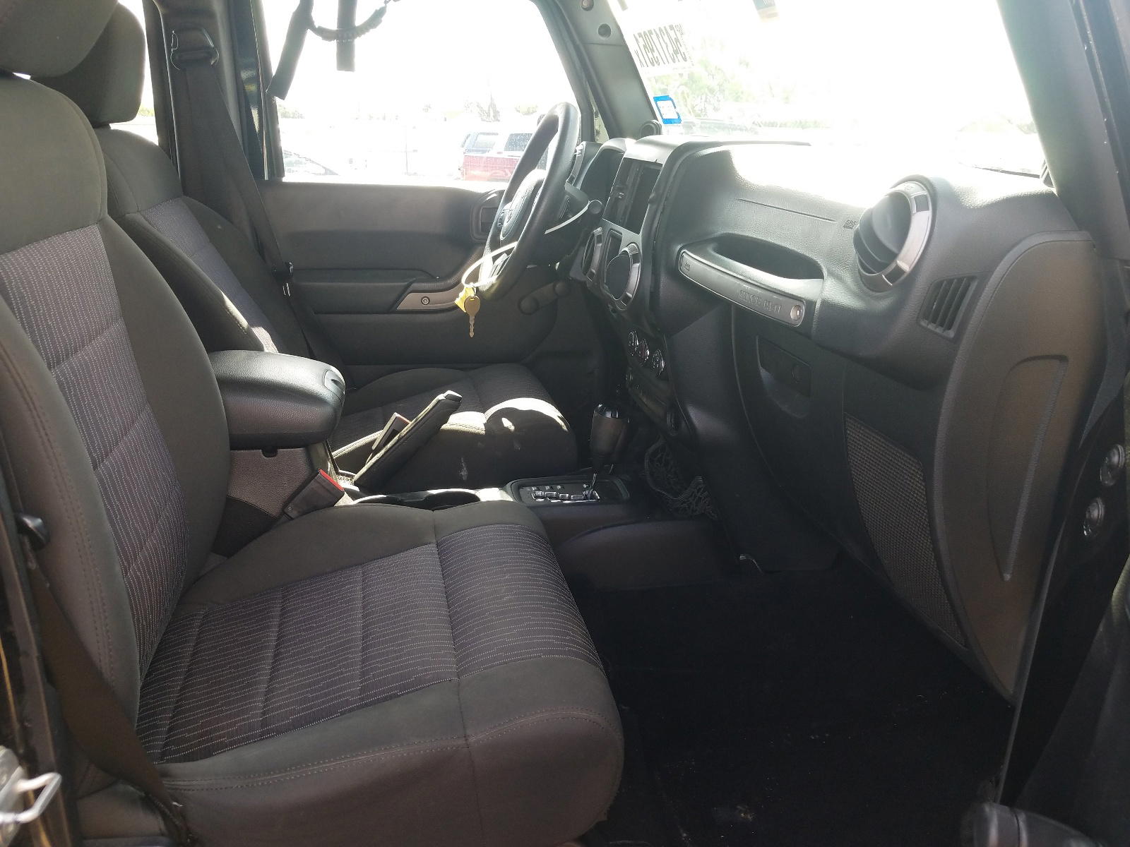 Photo 5 from auction – 2012 JEEP WRANGLER U with VIN 1C4BJWDG9CL113285
