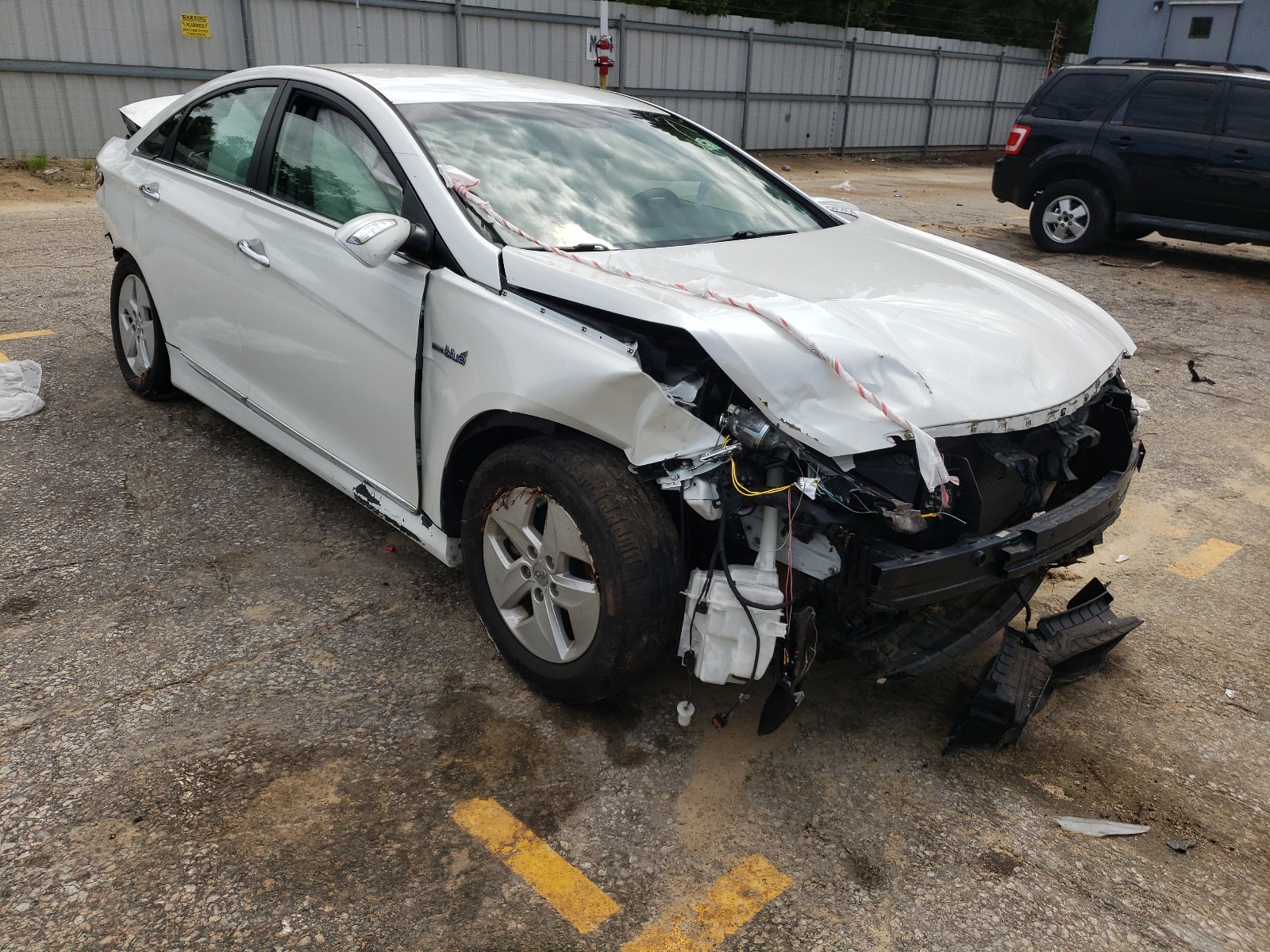 HYUNDAI SONATA HYB 2012 with VIN KMHEC4A4XCA035788 - Photo from auction