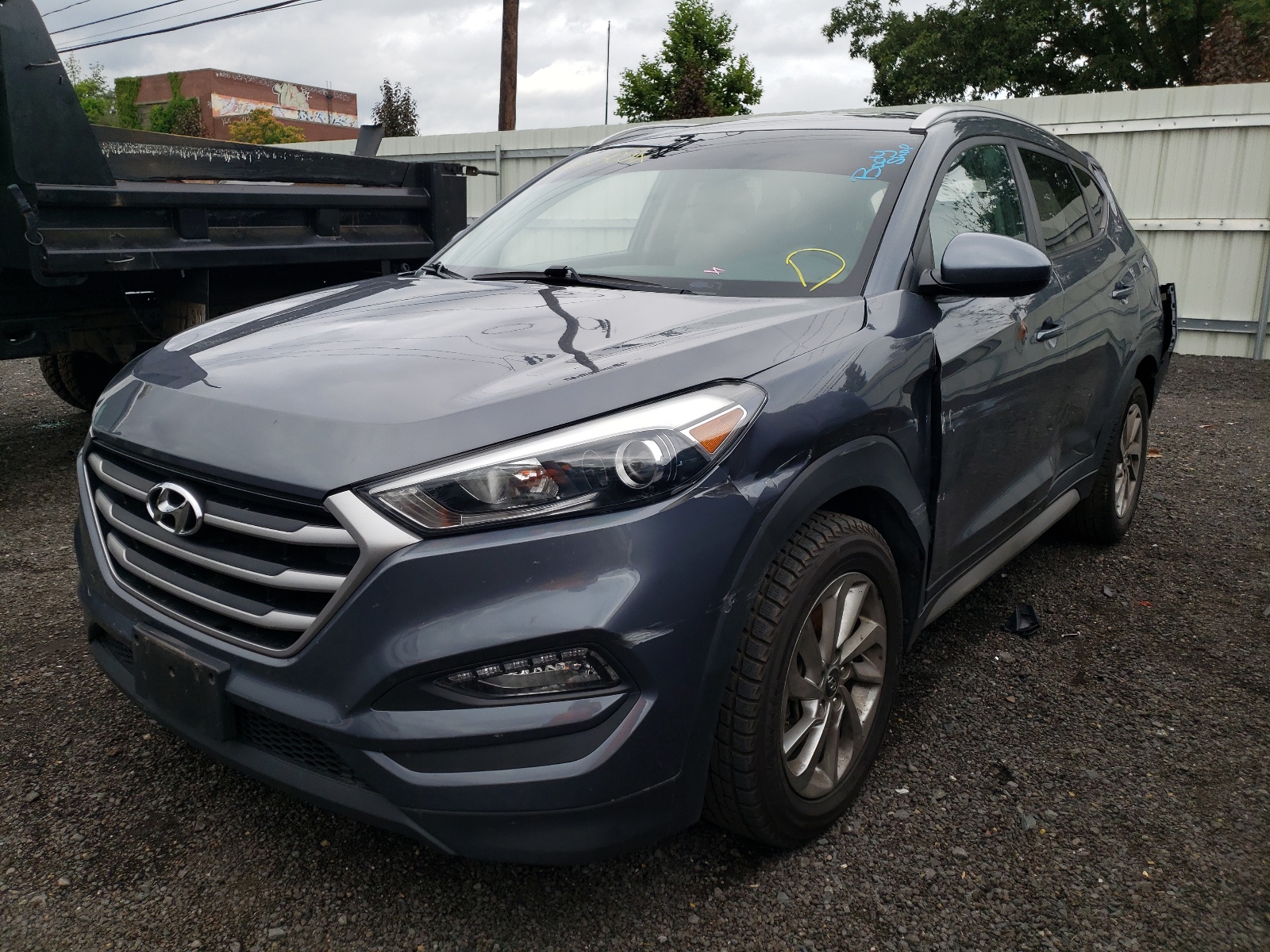 Photo 2 from auction – 2018 HYUNDAI TUCSON SEL with VIN KM8J3CA44JU718820