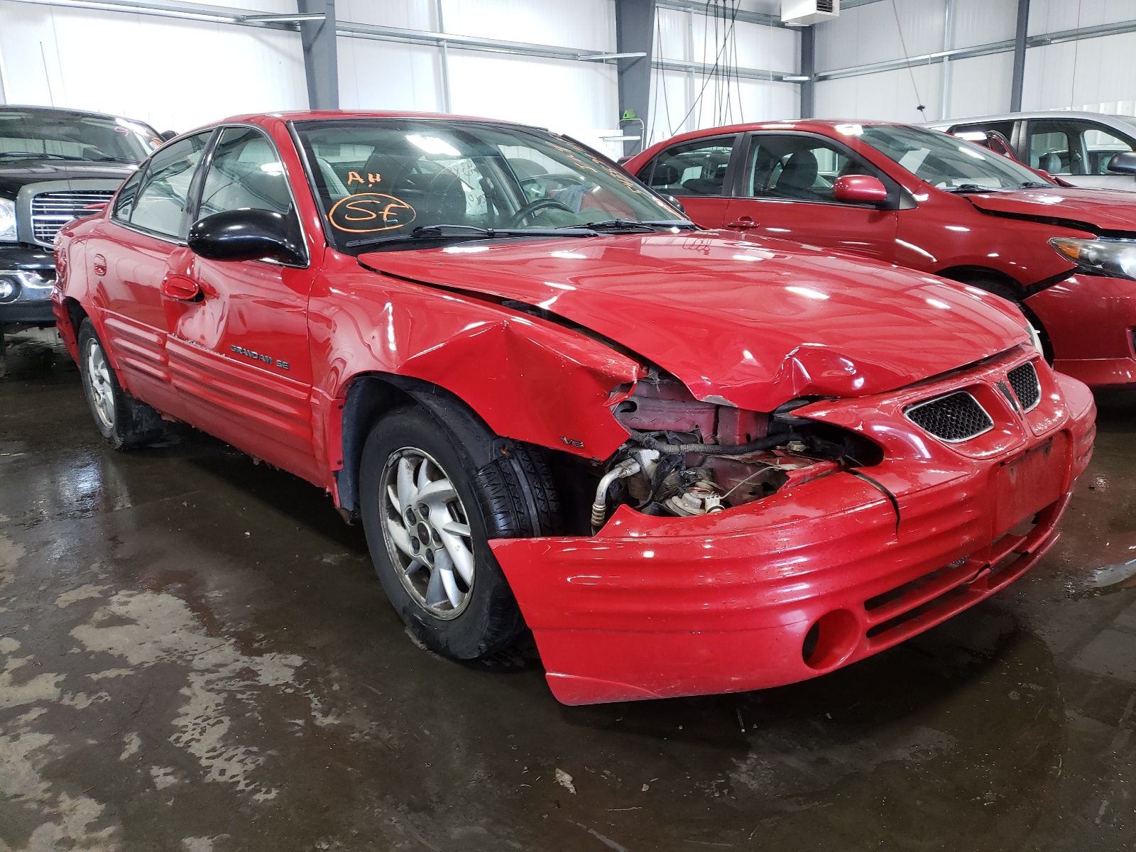 PONTIAC GRAND AM S 2002 with VIN 1G2NF52E52C101101 - Photo from auction