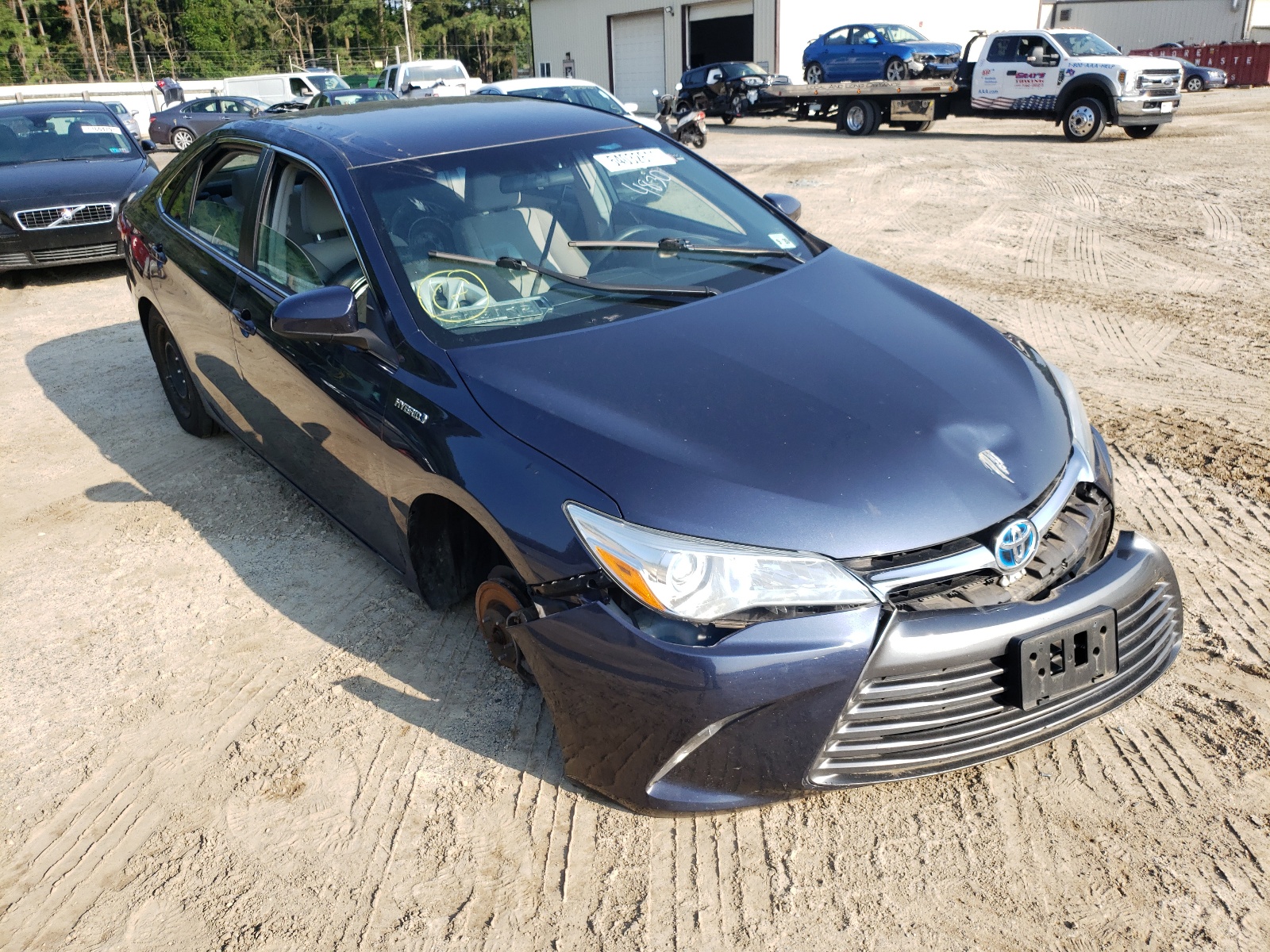 Photo 1 from auction – 2016 TOYOTA CAMRY HYBR with VIN 4T1BD1FK9GU179357