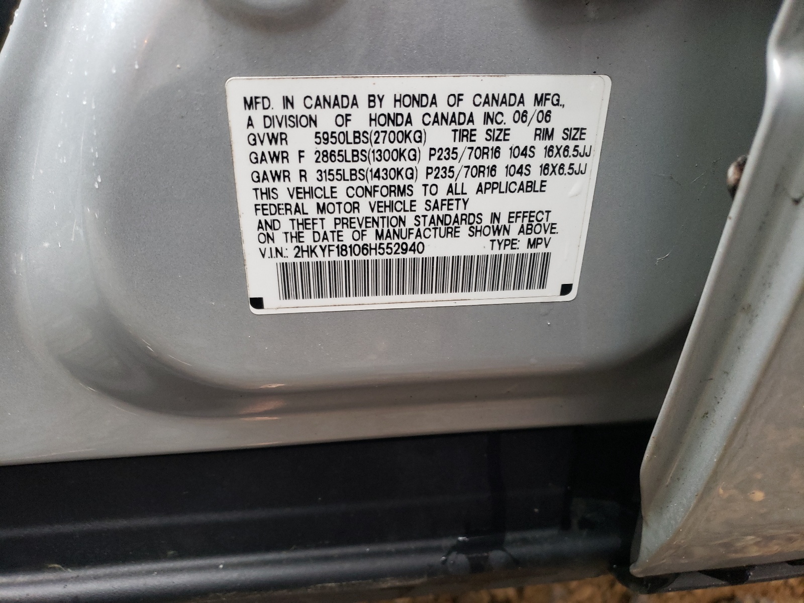 Photo 10 from auction – 2006 HONDA PILOT LX with VIN 2HKYF18106H552940