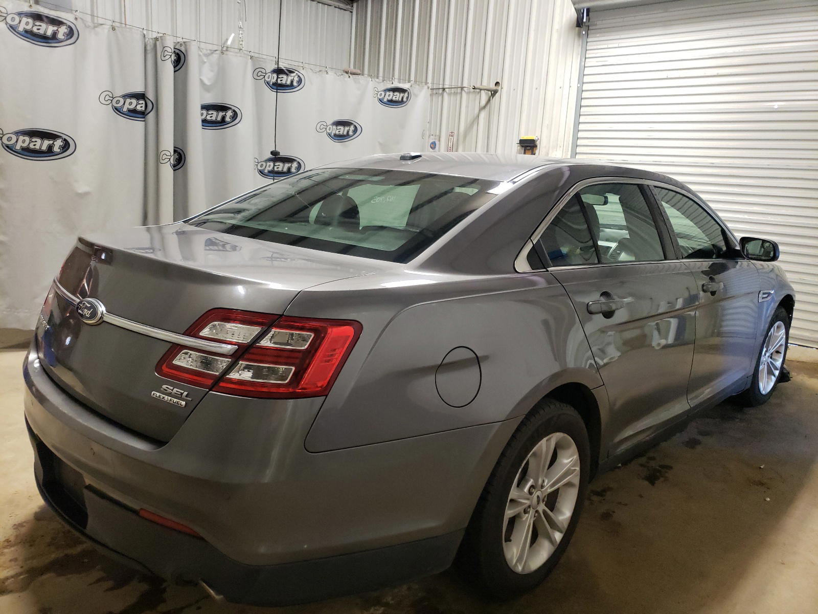 Photo 4 from auction – 2013 FORD TAURUS SEL with VIN 1FAHP2E81DG165910
