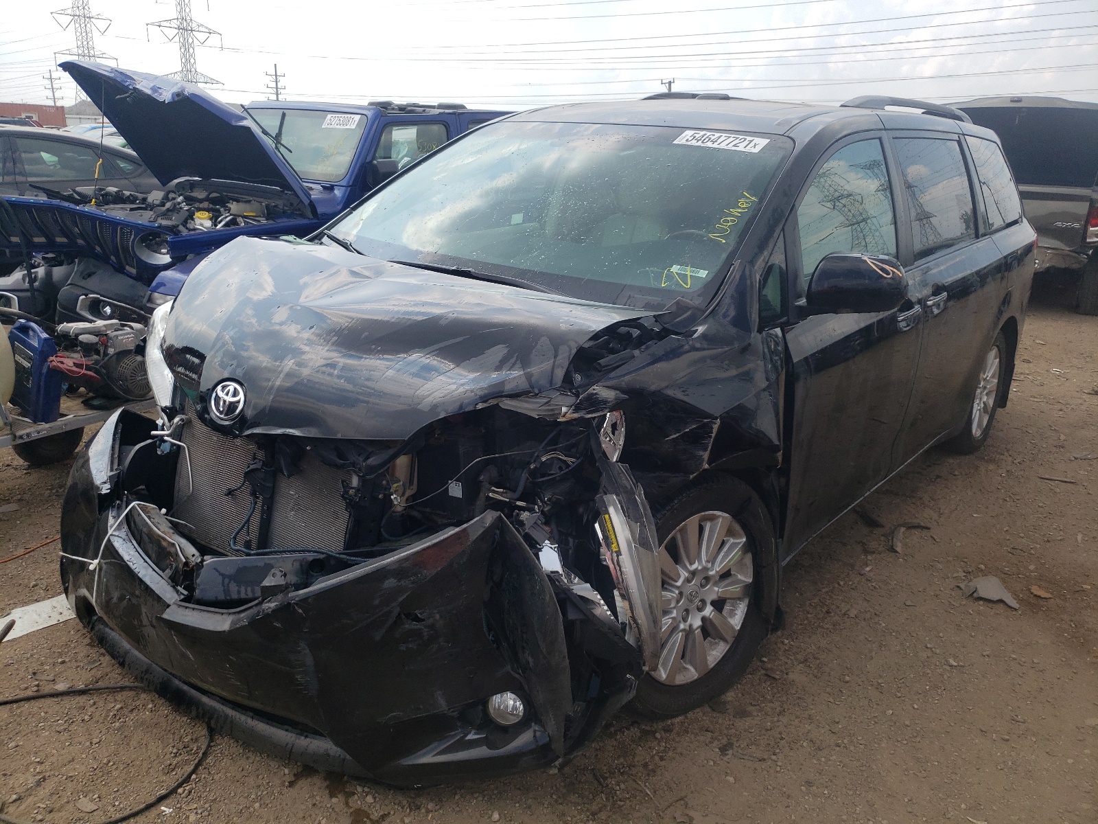 Photo 2 from auction – 2011 TOYOTA SIENNA XLE with VIN 5TDDK3DC7BS010963