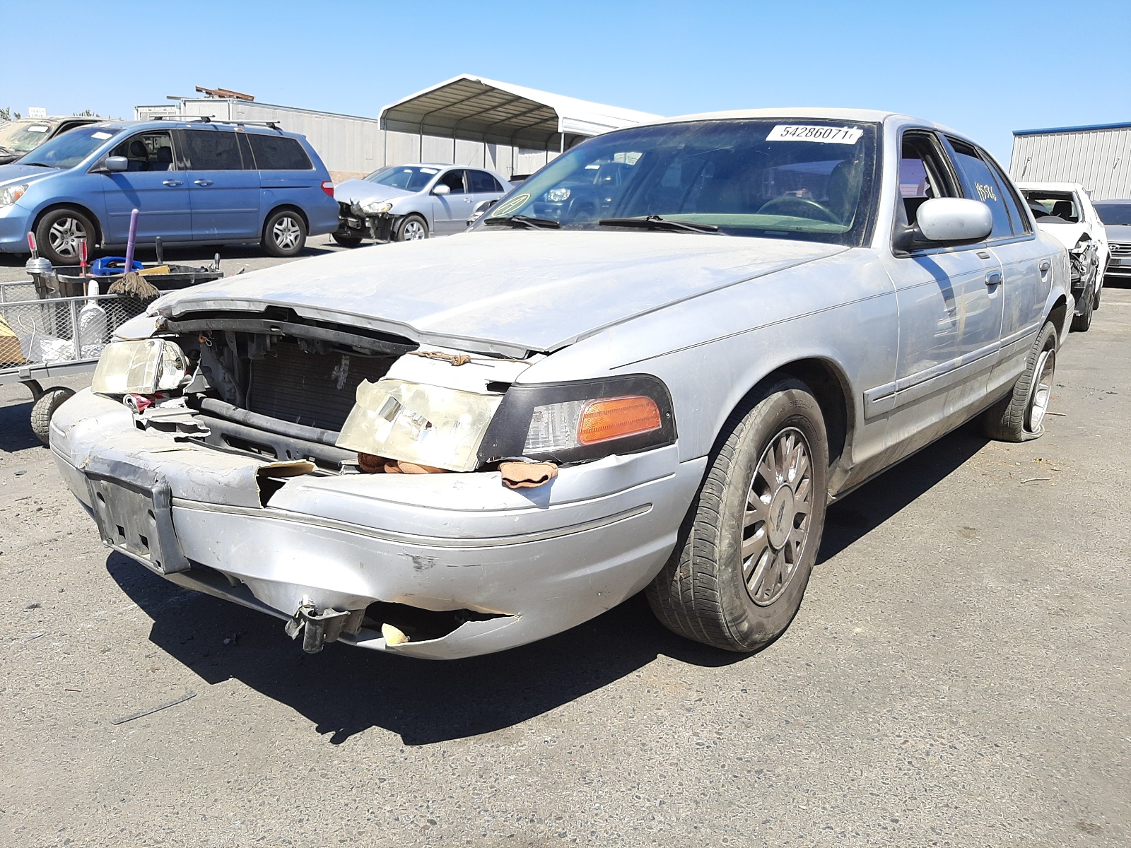 Photo 2 from auction – 2003 FORD CROWN VICT with VIN 2FAHP74W03X124495