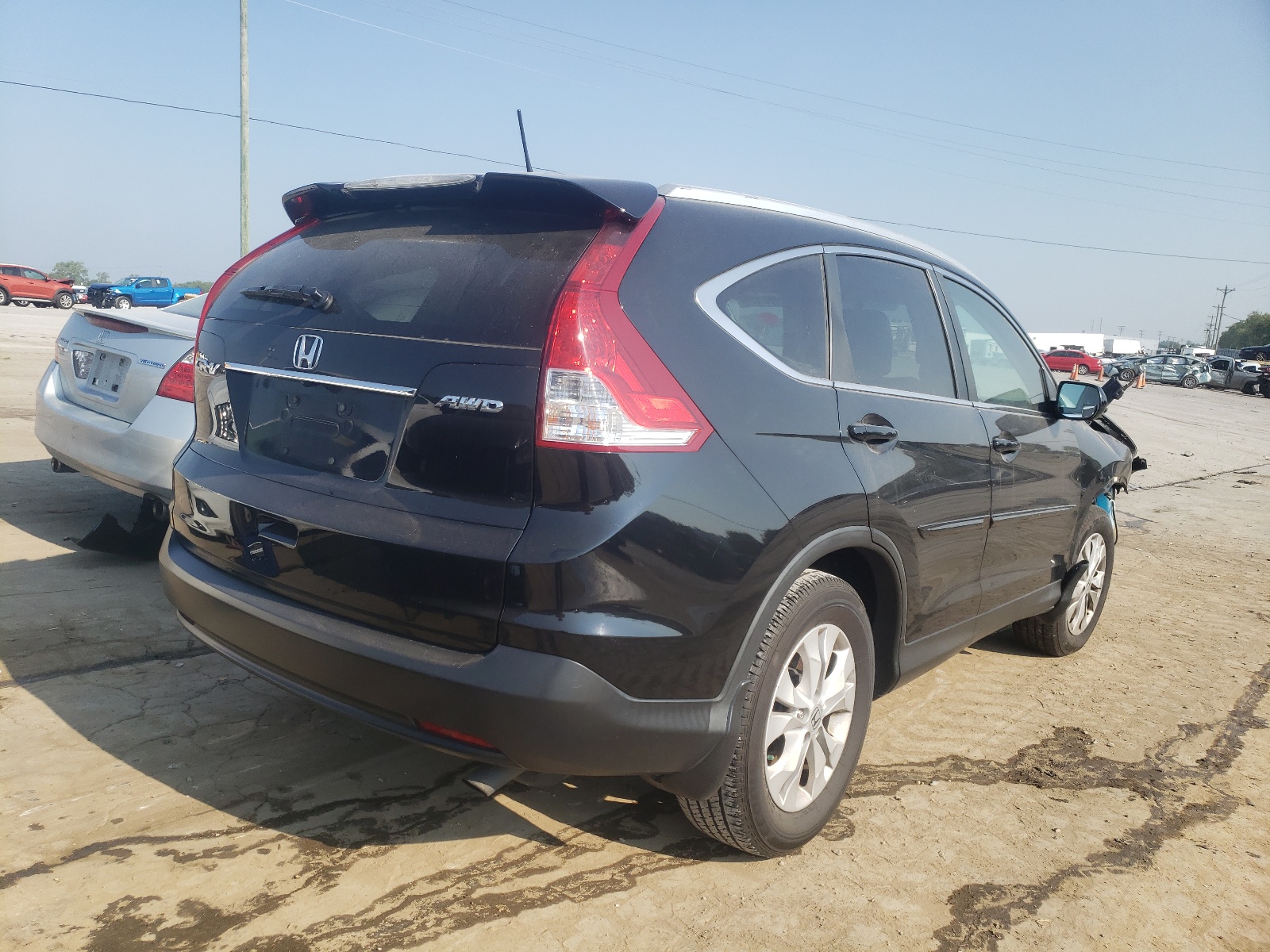 Photo 4 from auction – 2013 HONDA CR-V EXL with VIN 5J6RM4H72DL035609