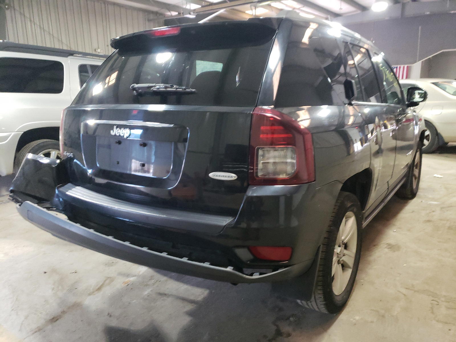 Photo 4 from auction – 2014 JEEP COMPASS LA with VIN 1C4NJDEB0ED600280