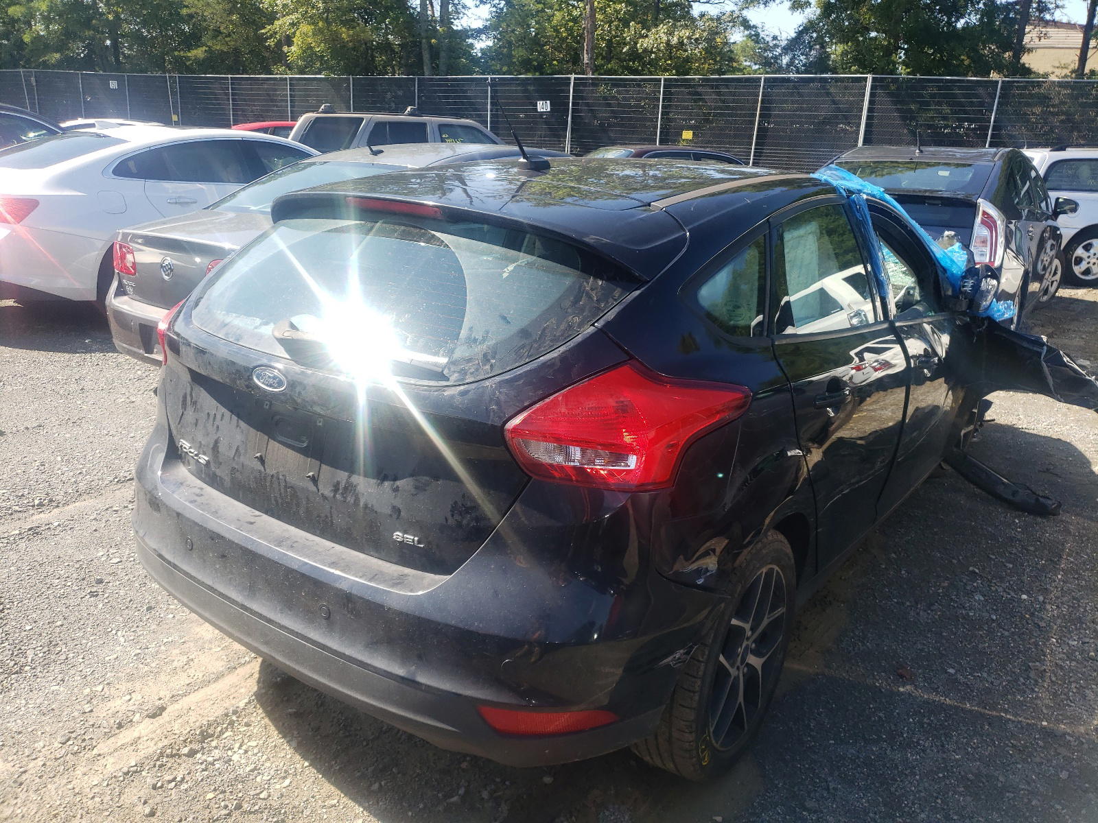 Photo 4 from auction – 2017 FORD FOCUS SEL with VIN 1FADP3M24HL201006